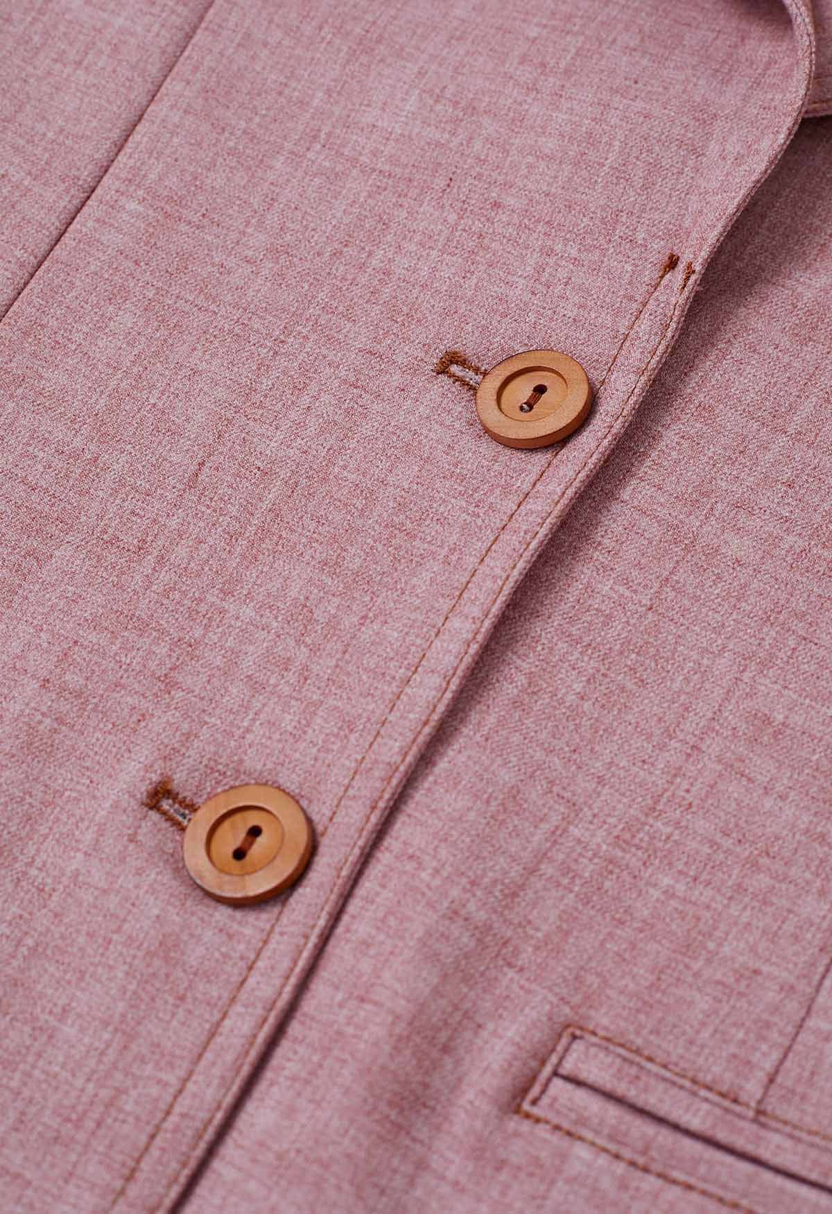 Blazer boutonné à revers pointus et poches décoratives en rose