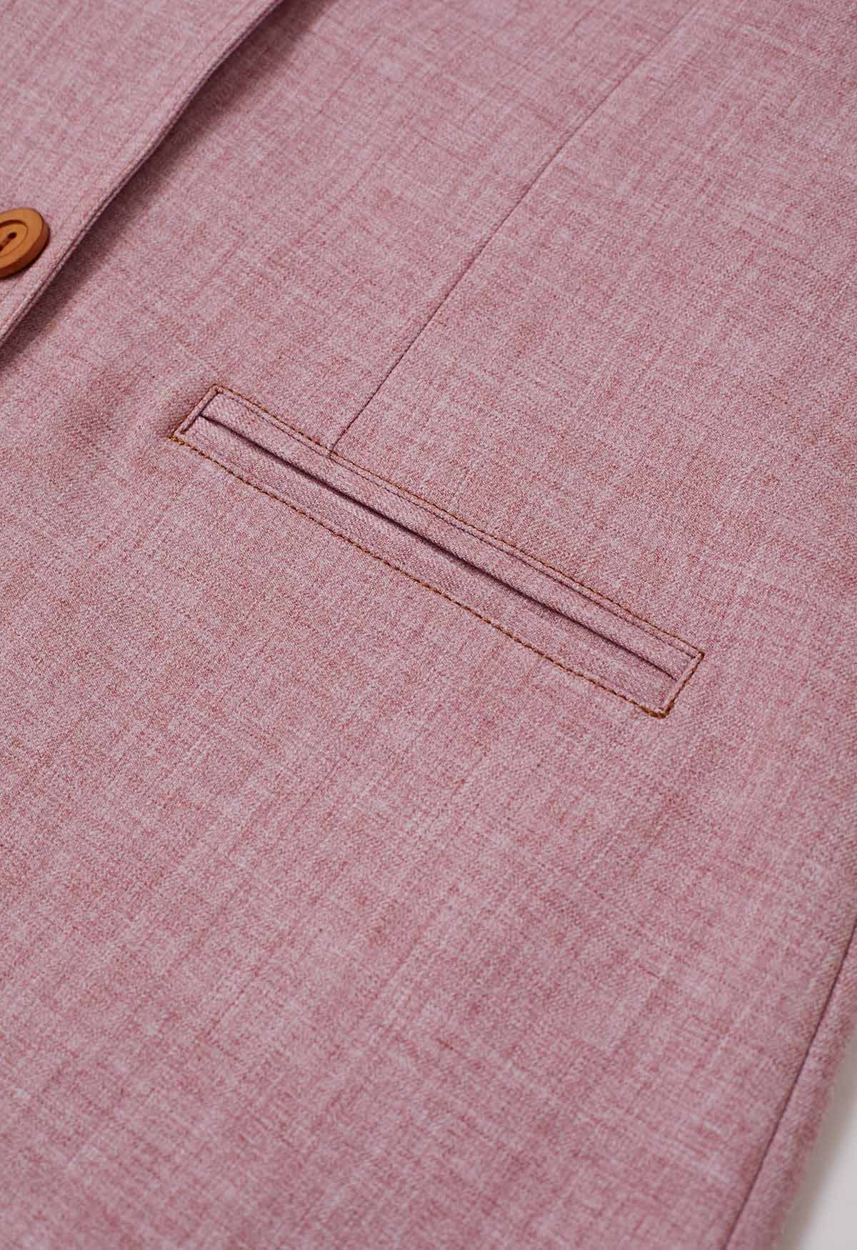 Blazer boutonné à revers pointus et poches décoratives en rose