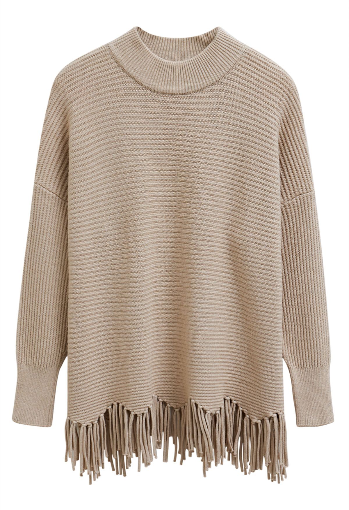 Pull en tricot à épaules tombantes et ourlet à franges asymétriques en beige clair