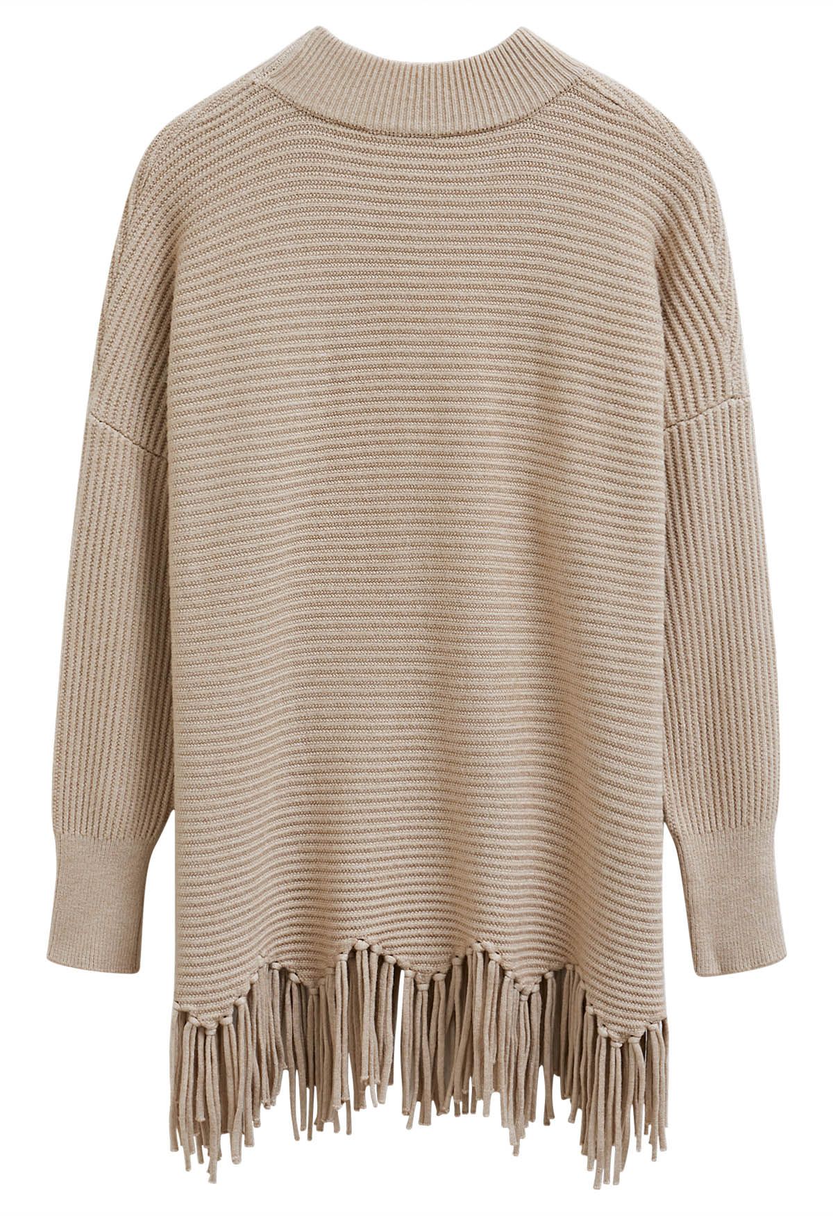 Pull en tricot à épaules tombantes et ourlet à franges asymétriques en beige clair