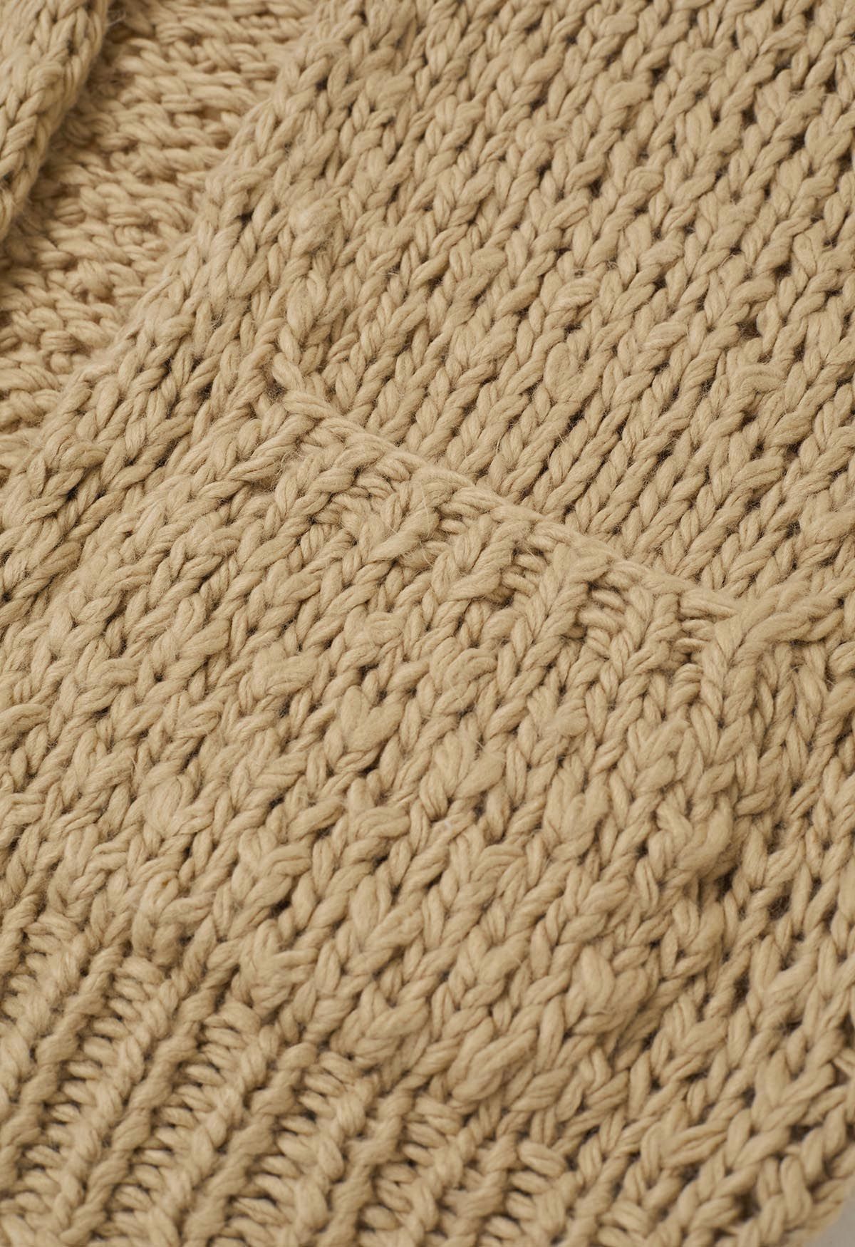 Cardigan ouvert sur le devant en tricot épais à poches plaquées, couleur beige clair