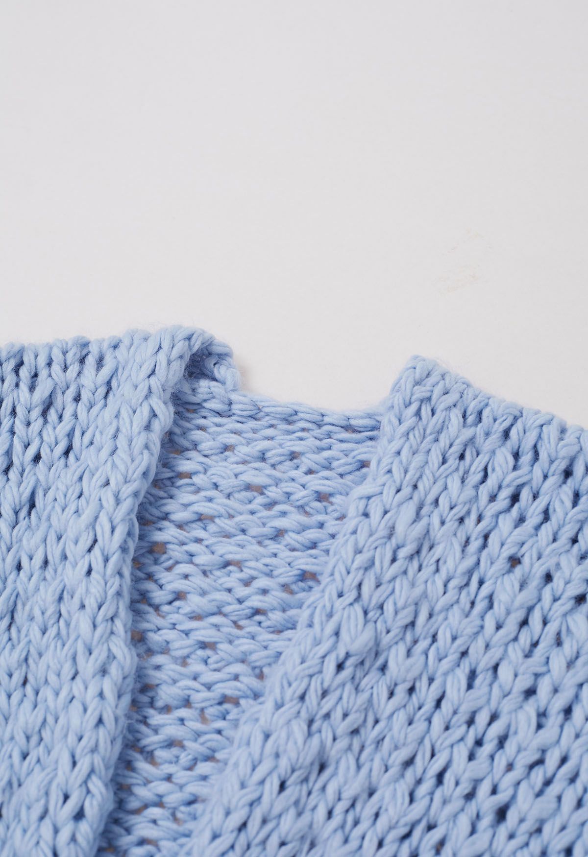 Cardigan ouvert sur le devant en tricot épais à poches plaquées, bleu bébé