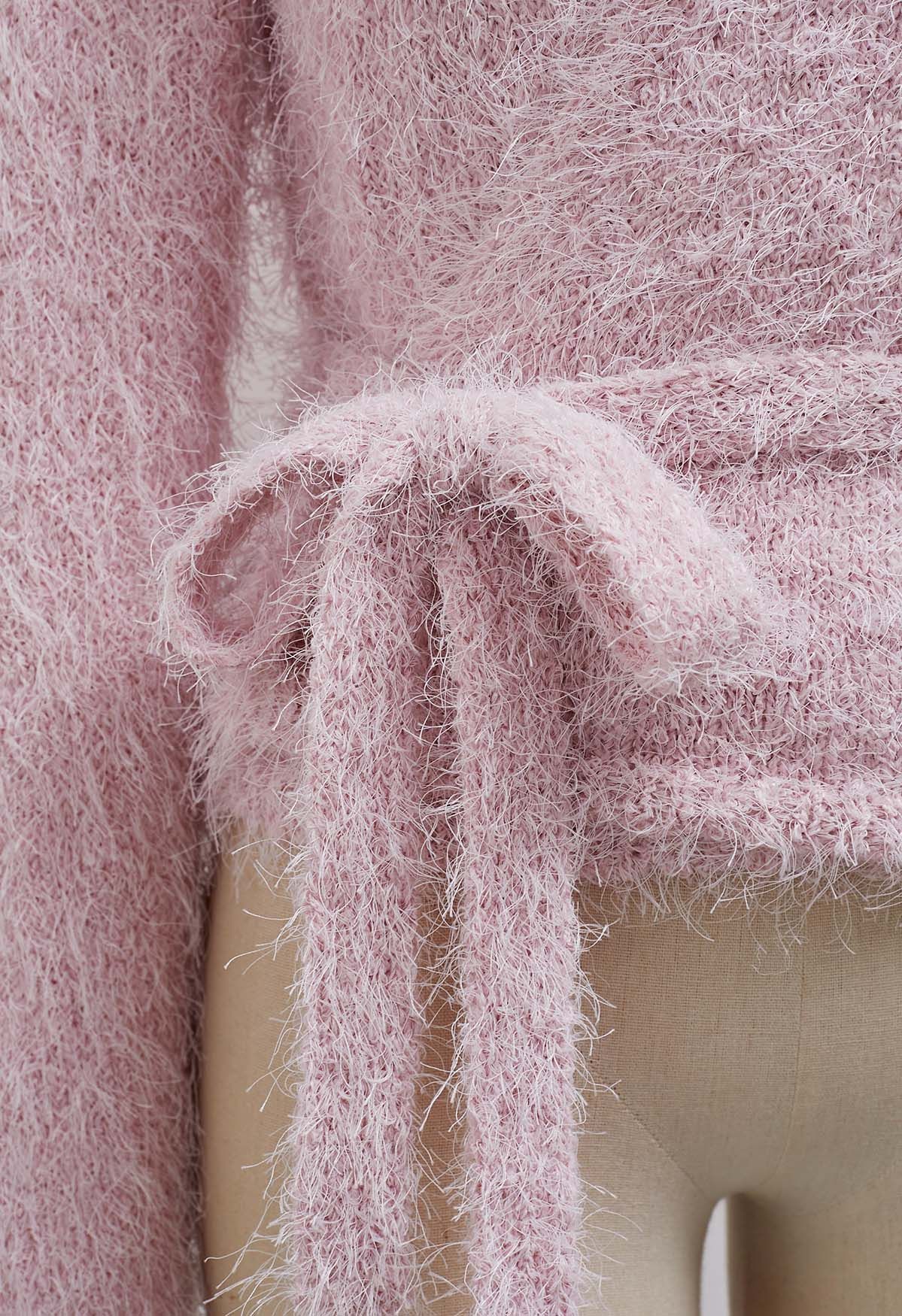 Haut en tricot pelucheux à col en V et taille nouée en rose clair