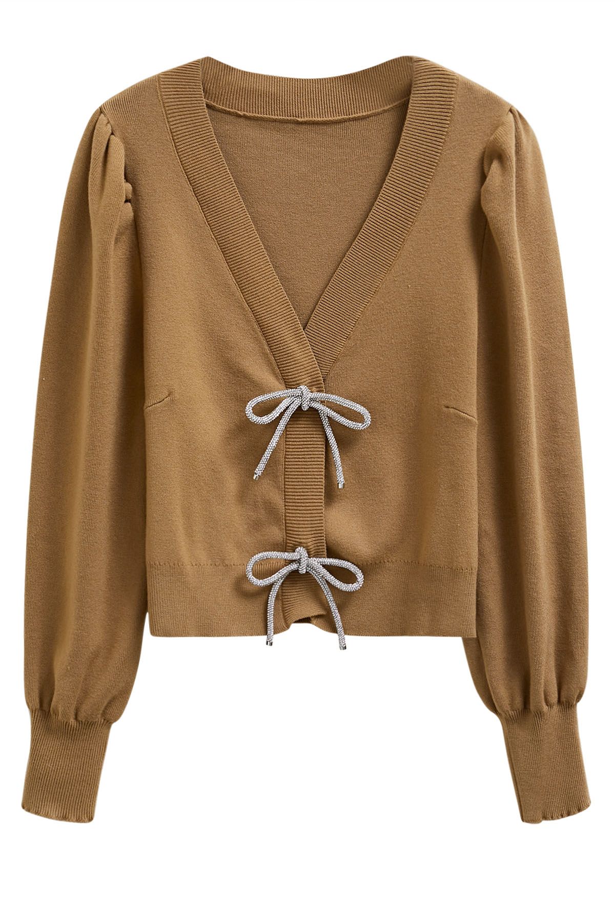 Cardigan en tricot boutonné à manches lanternes et nœud papillon scintillant en camel