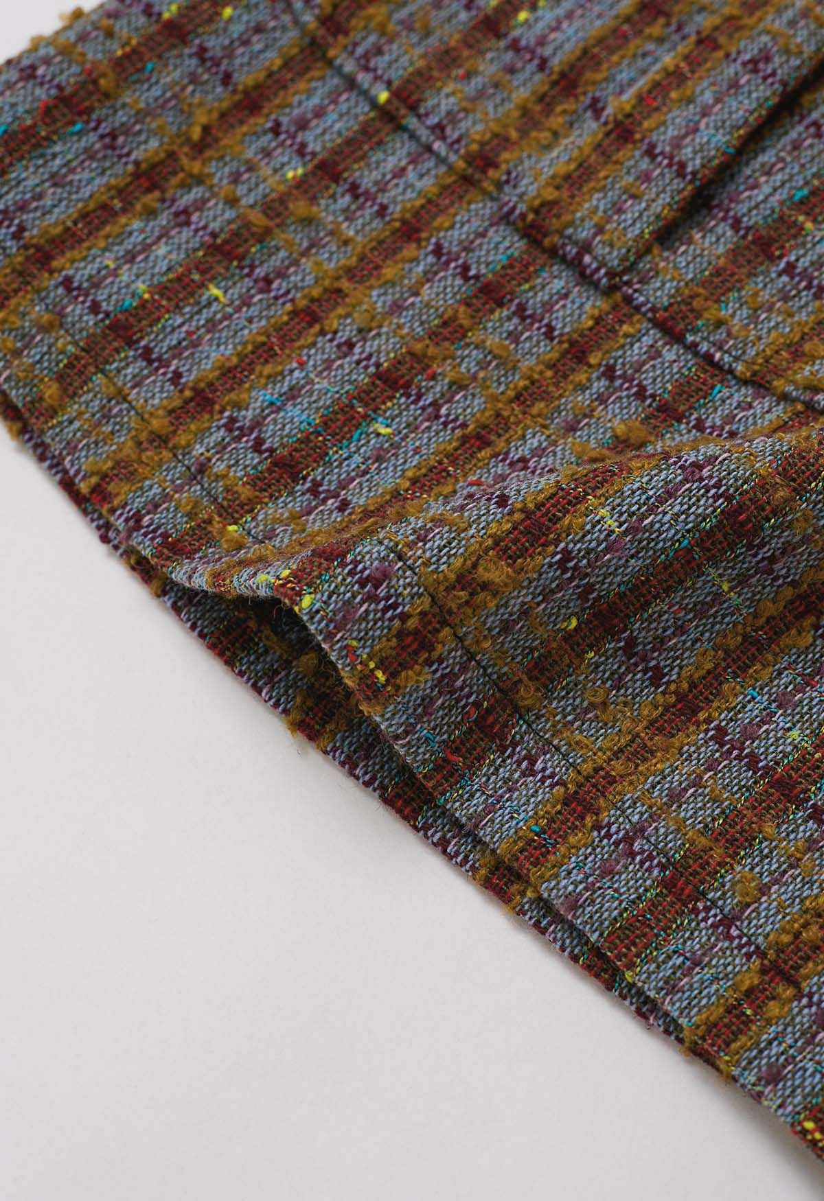 Mini-jupe asymétrique en tweed à carreaux bleu