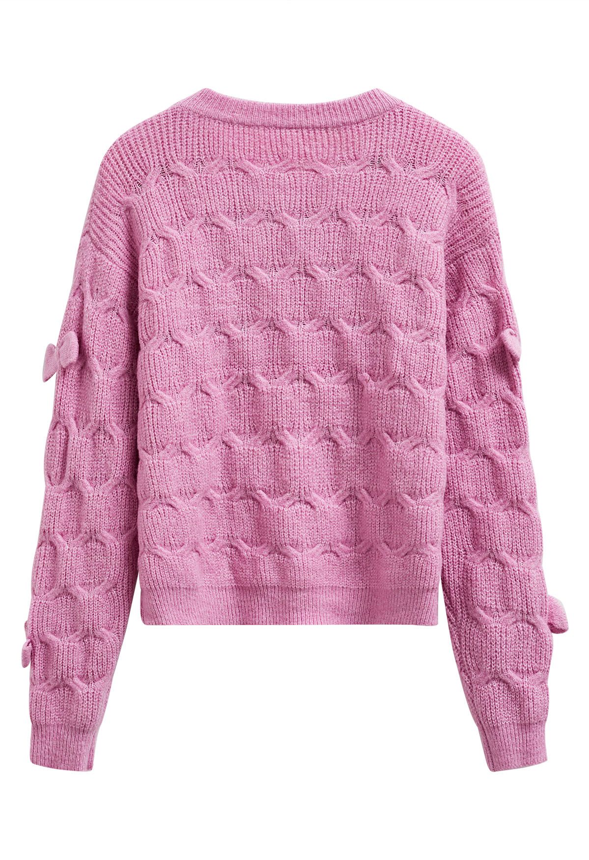 Pull en tricot texturé géométrique à nœud ludique en rose