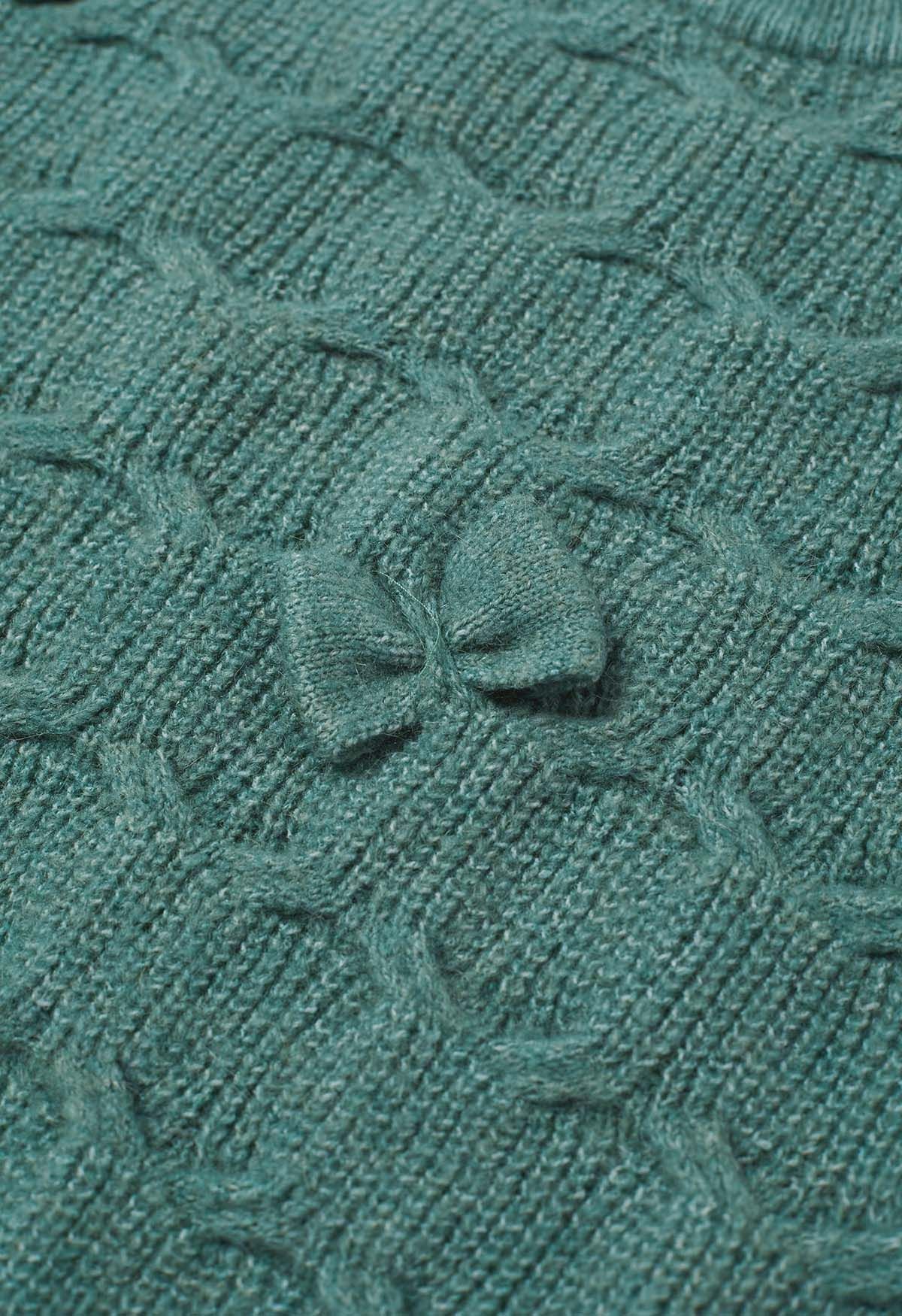 Pull en tricot texturé géométrique à nœud ludique en vert