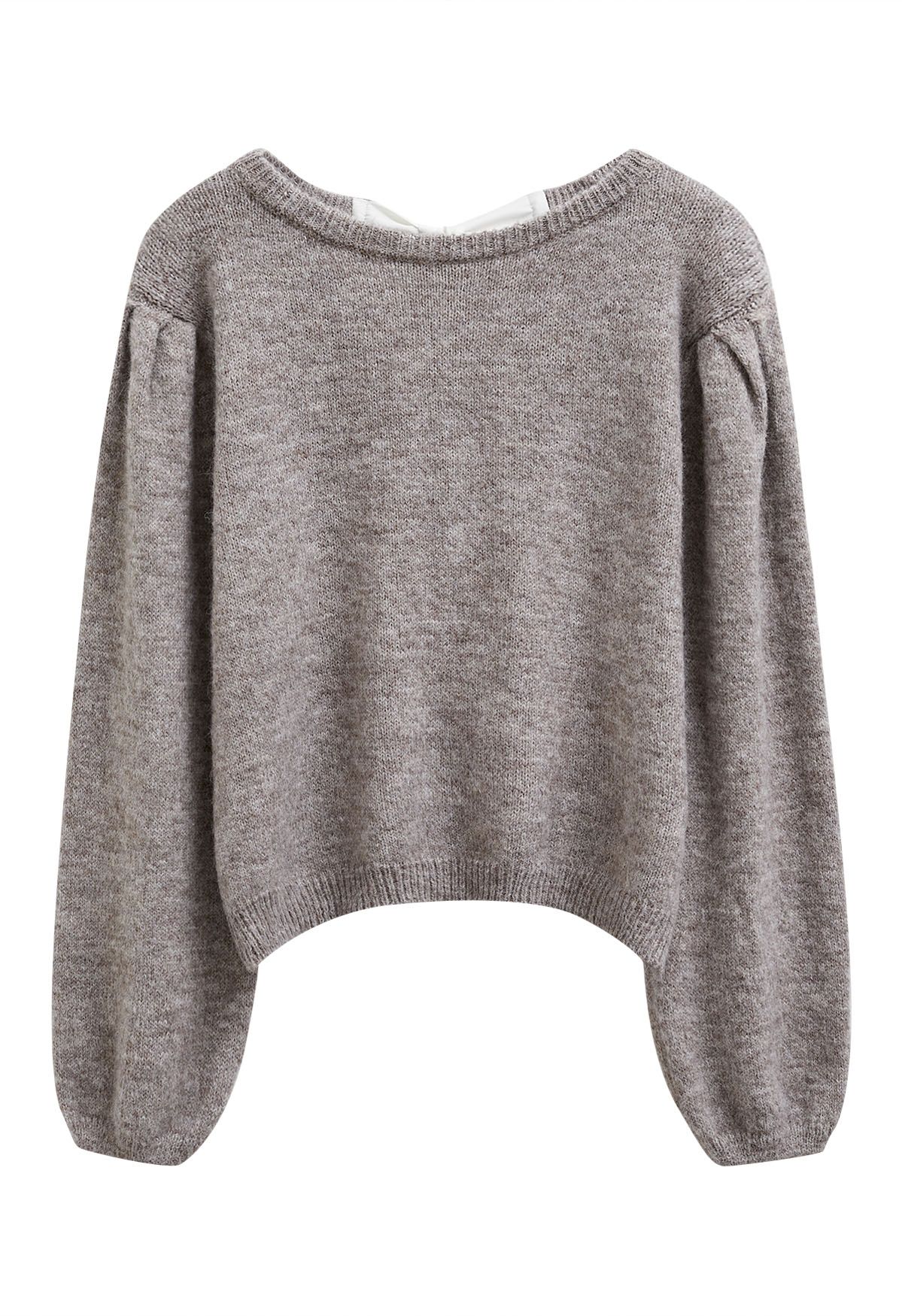 Pull en tricot à manches bouffantes et nœud dans le dos en taupe