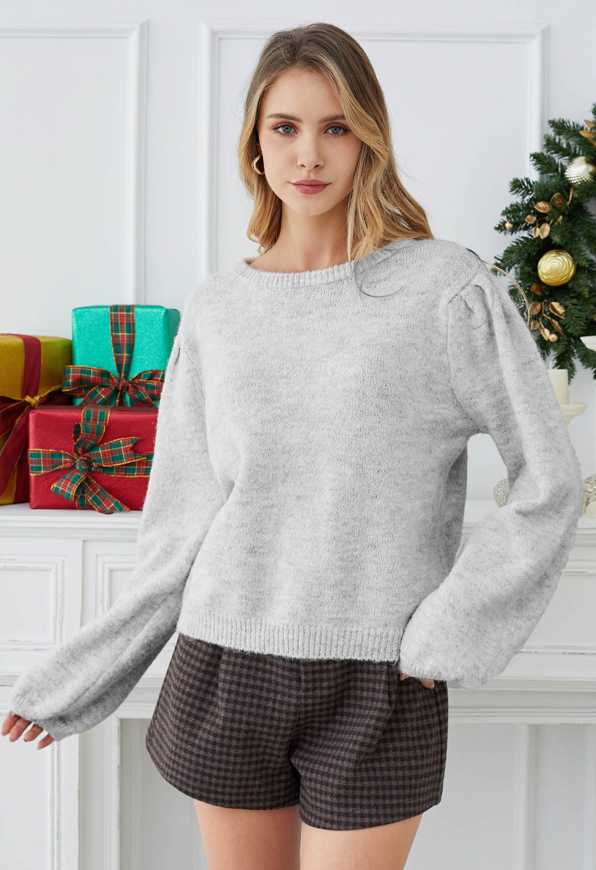 Pull en tricot à manches bouffantes et nœud dans le dos en gris