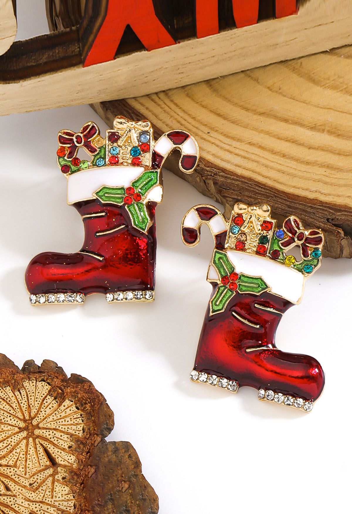 Boucles d'oreilles de Noël en forme de bottes avec ornement festif