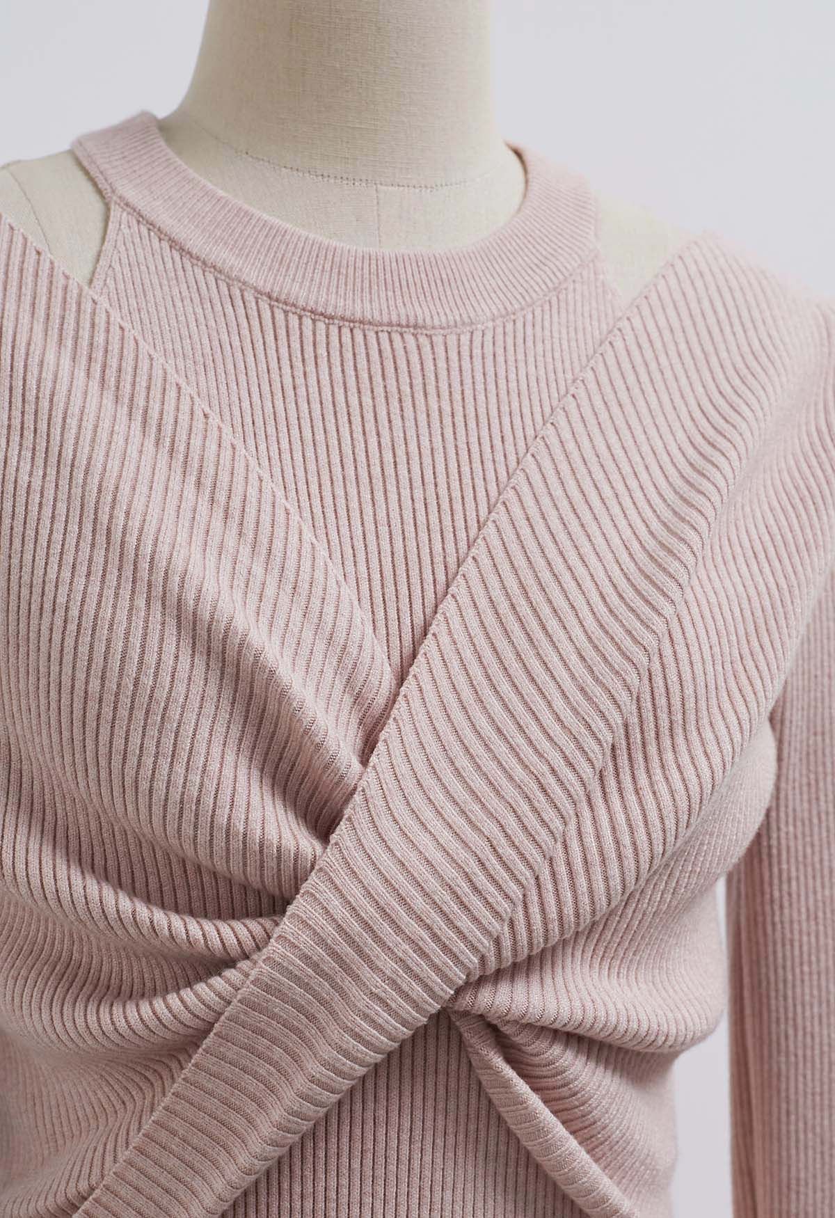 Robe mi-longue en tricot à découpes et devant croisé en rose