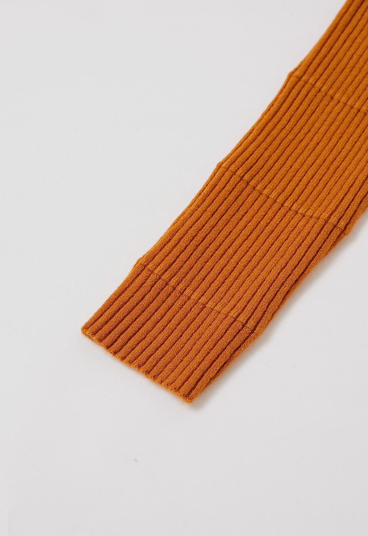 Haut en tricot côtelé à col roulé doux en orange