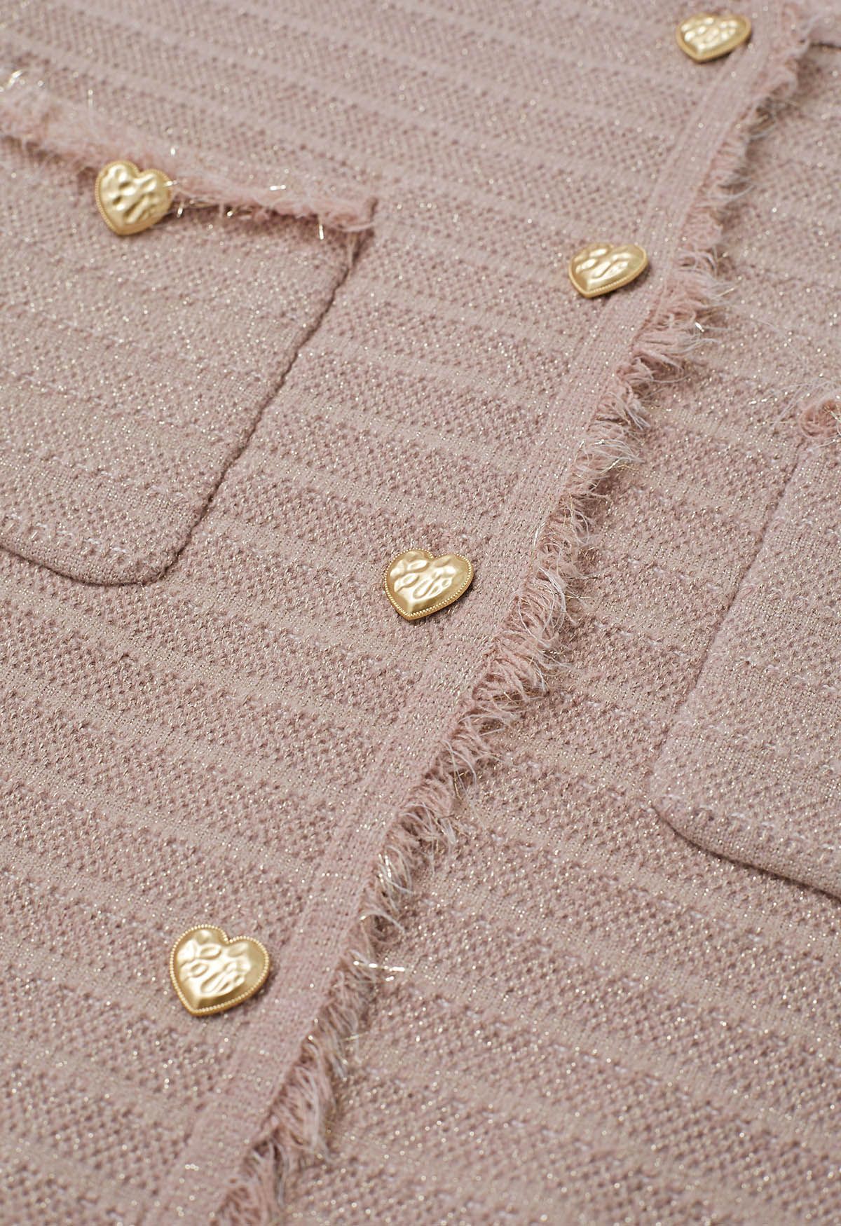 Cardigan en tricot métallisé à bordures à pompons en rose clair