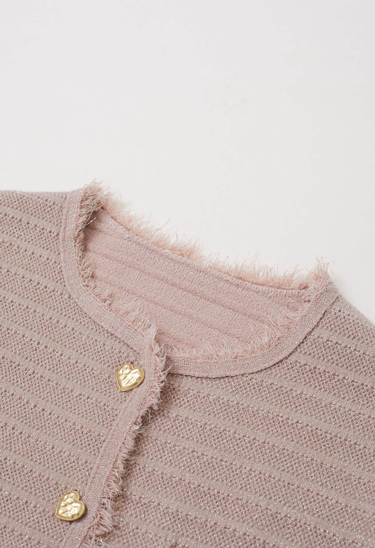 Cardigan en tricot métallisé à bordures à pompons en rose clair