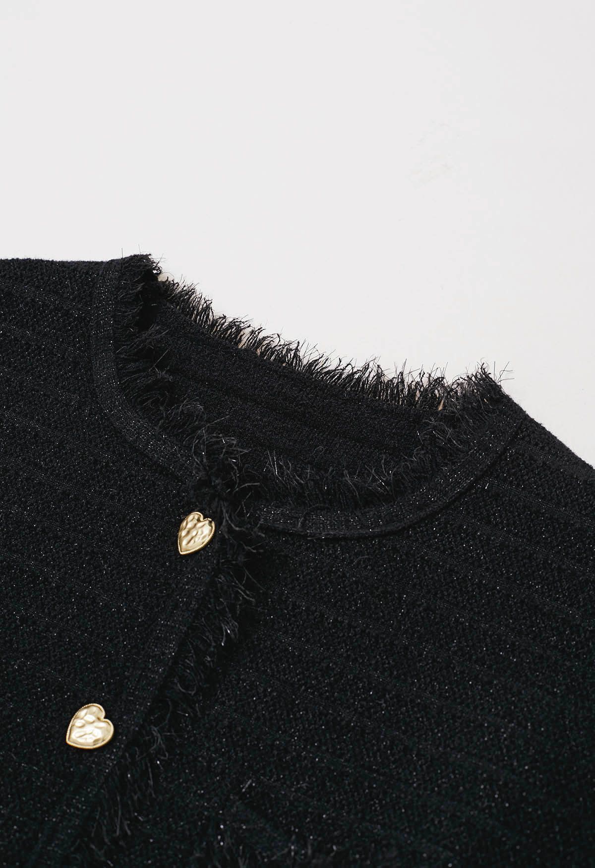 Cardigan en tricot métallisé à bordures à pompons en noir