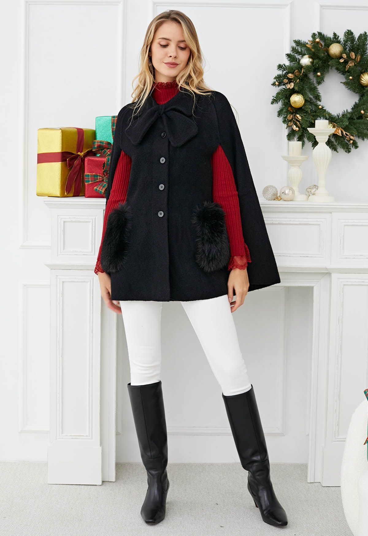 Manteau cape en tricot boutonné avec poche en fausse fourrure et décor de nœud papillon en noir