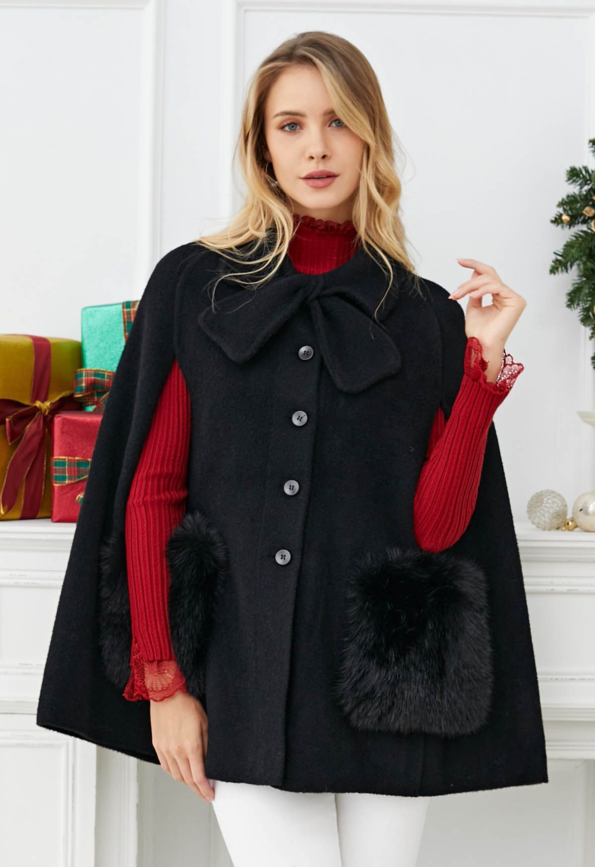 Manteau cape en tricot boutonné avec poche en fausse fourrure et décor de nœud papillon en noir