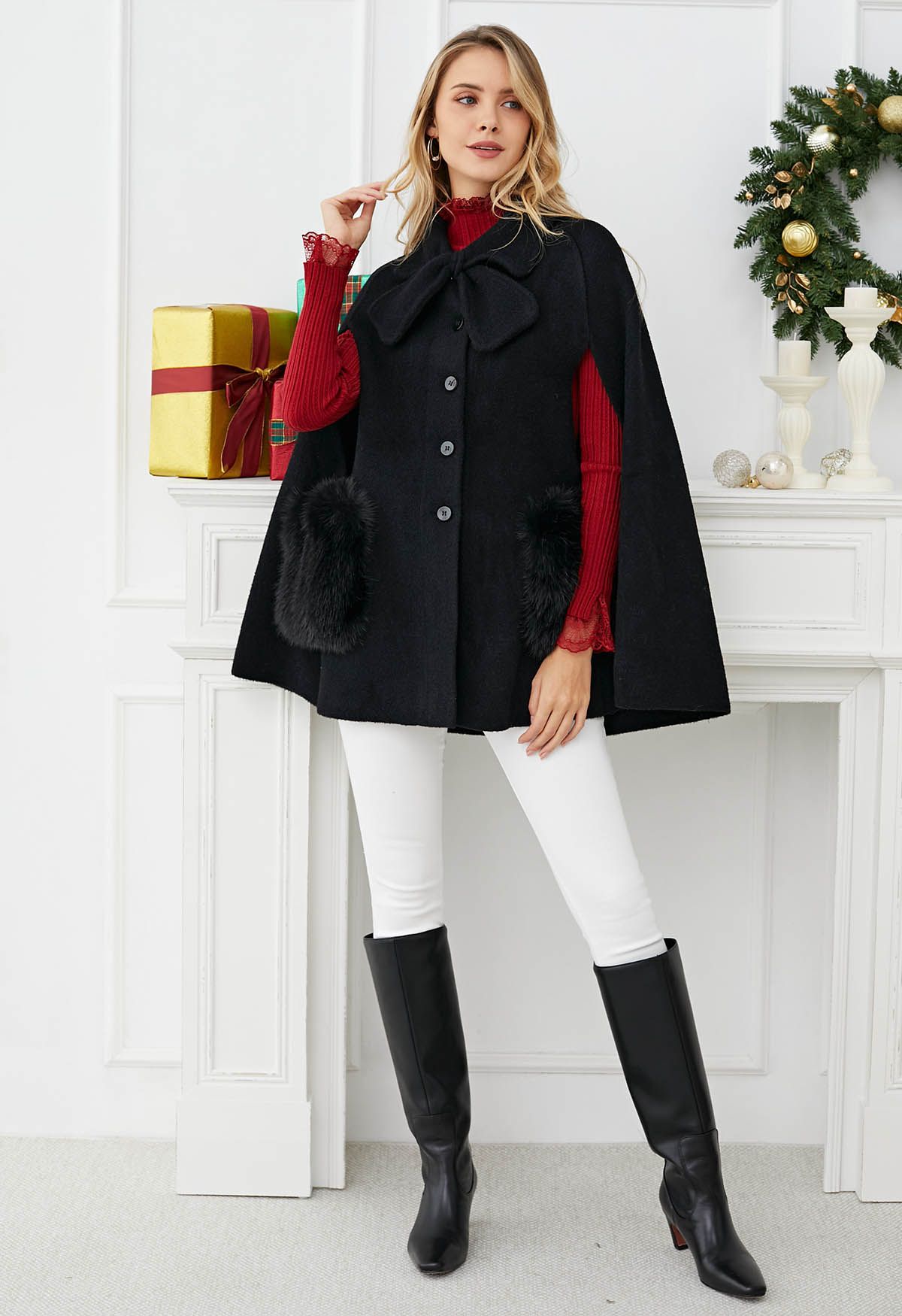 Manteau cape en tricot boutonné avec poche en fausse fourrure et décor de nœud papillon en noir