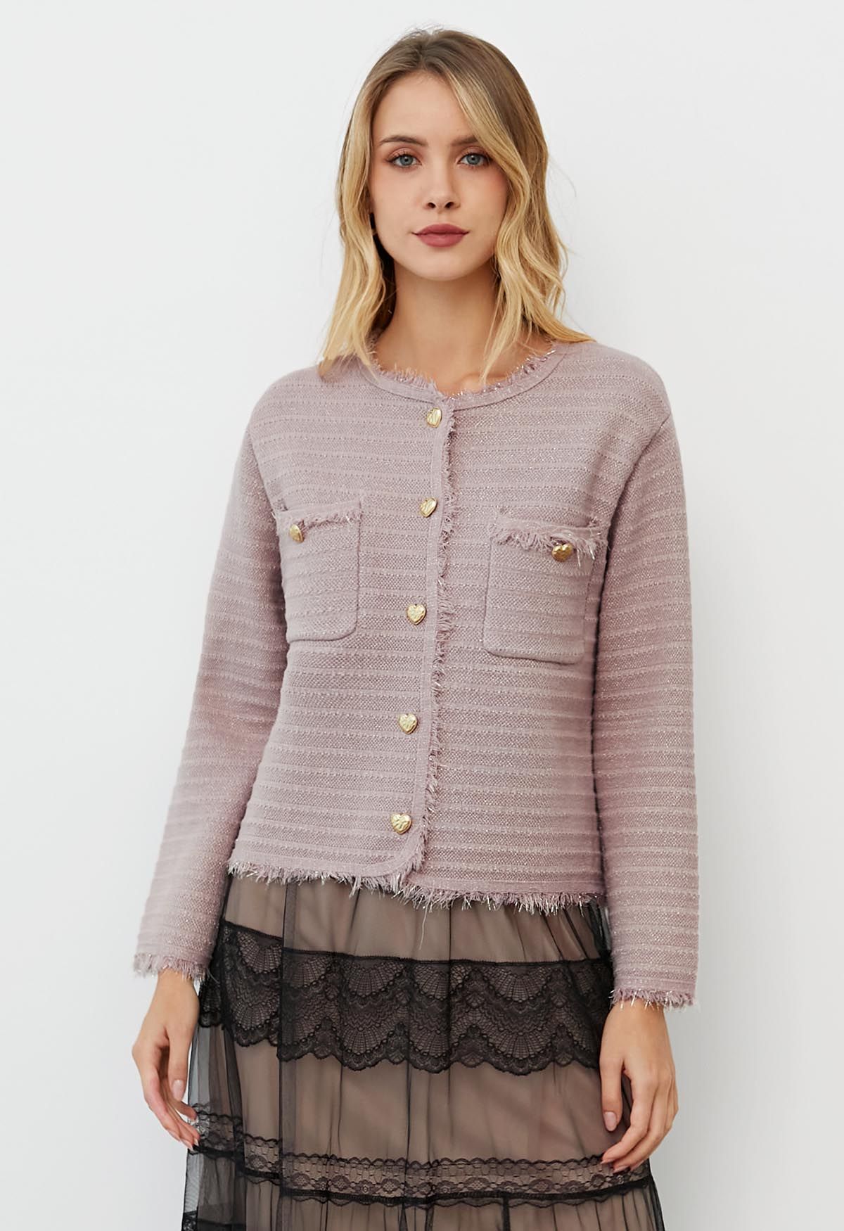 Cardigan en tricot métallisé à bordures à pompons en rose clair