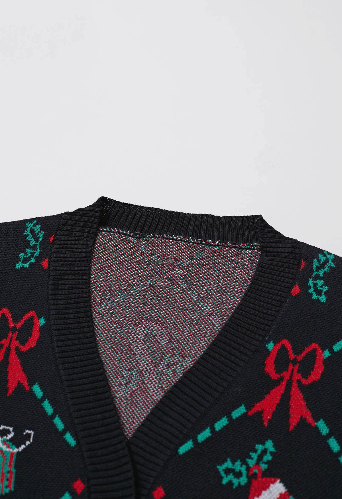 Cardigan en tricot avec éléments de Noël joyeux