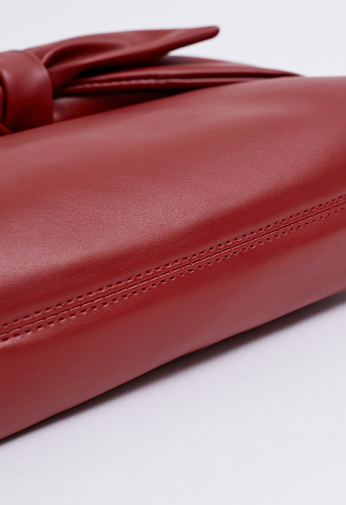 Ravissante pochette en PU avec nœud en rouge