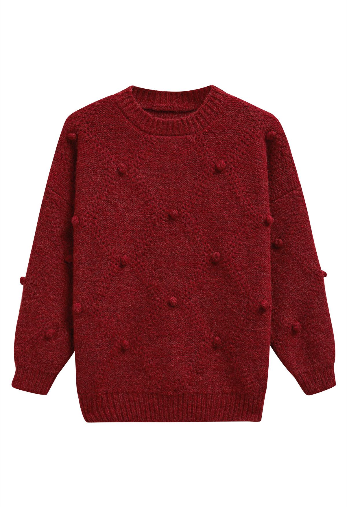 Pull en tricot à pompons en diamant en rouge