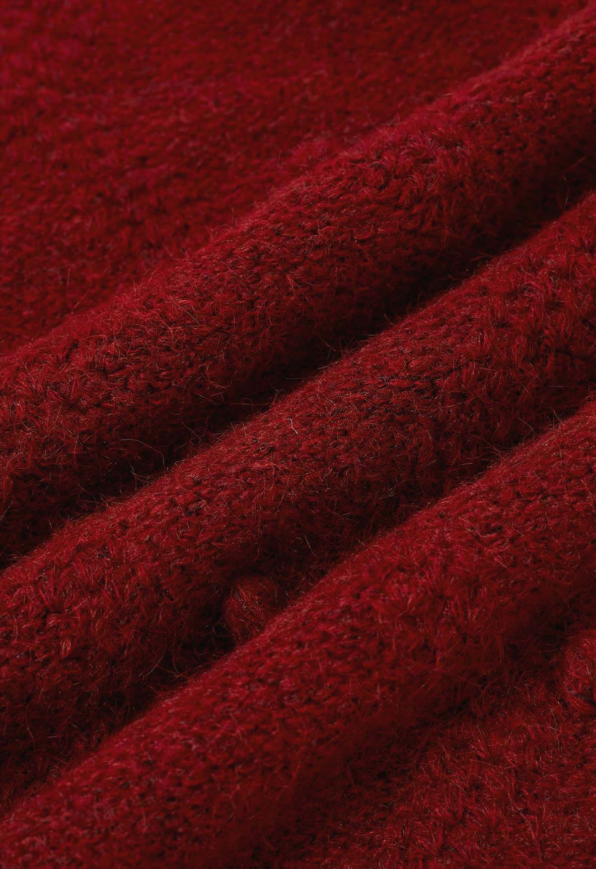 Pull en tricot à pompons en diamant en rouge