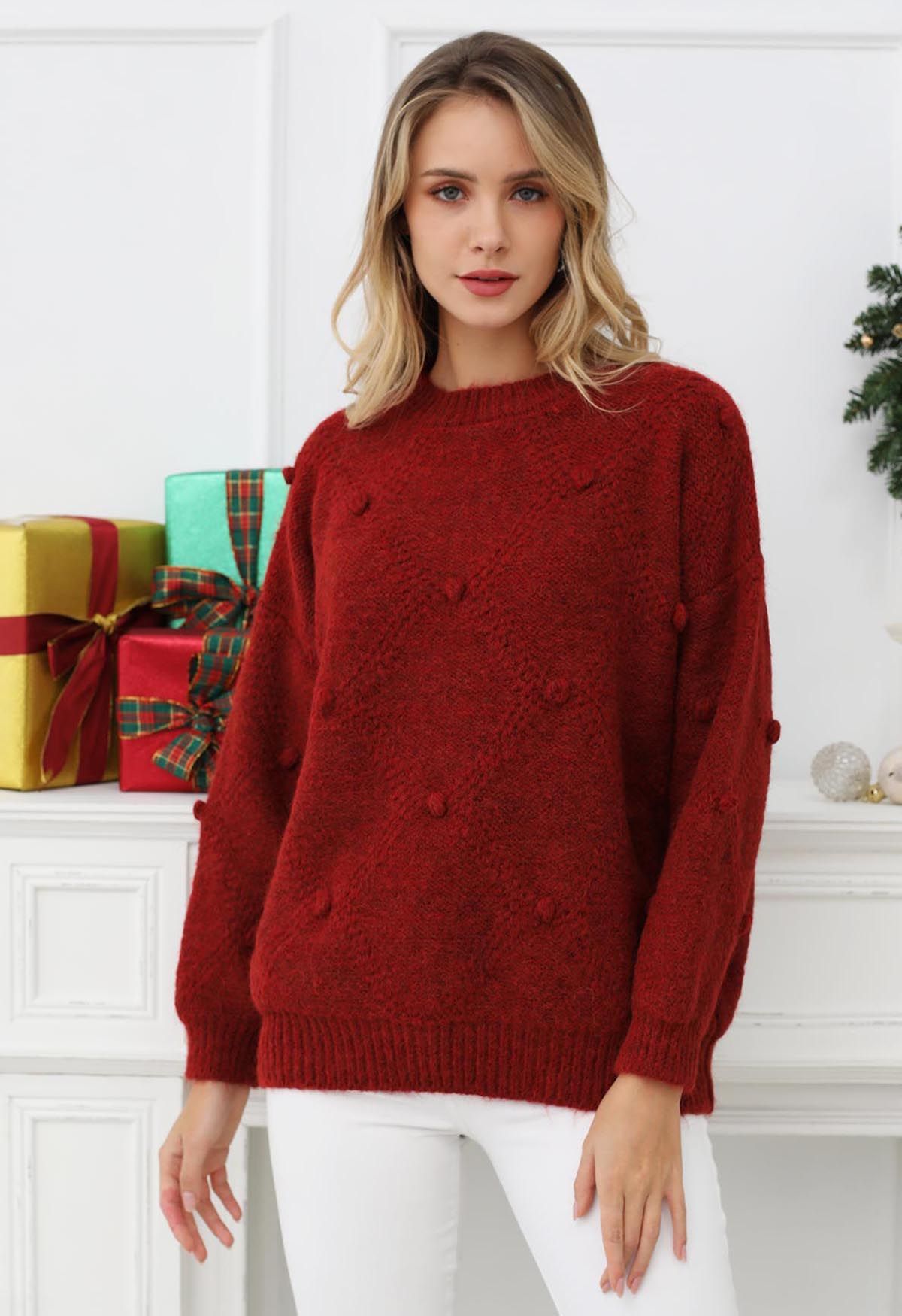 Pull en tricot à pompons en diamant en rouge