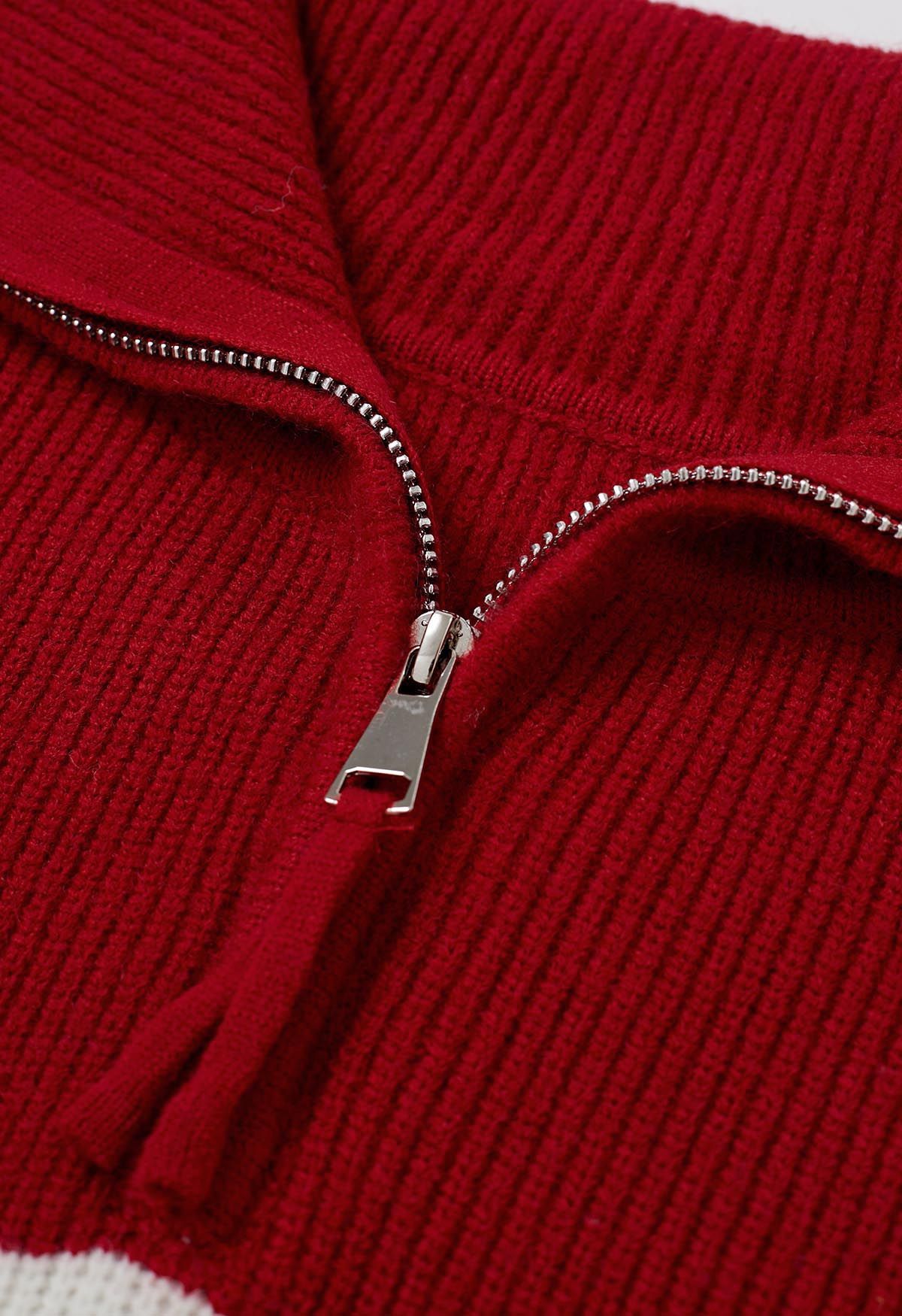 Pull en tricot rayé à col rabattu et fermeture éclair en rouge