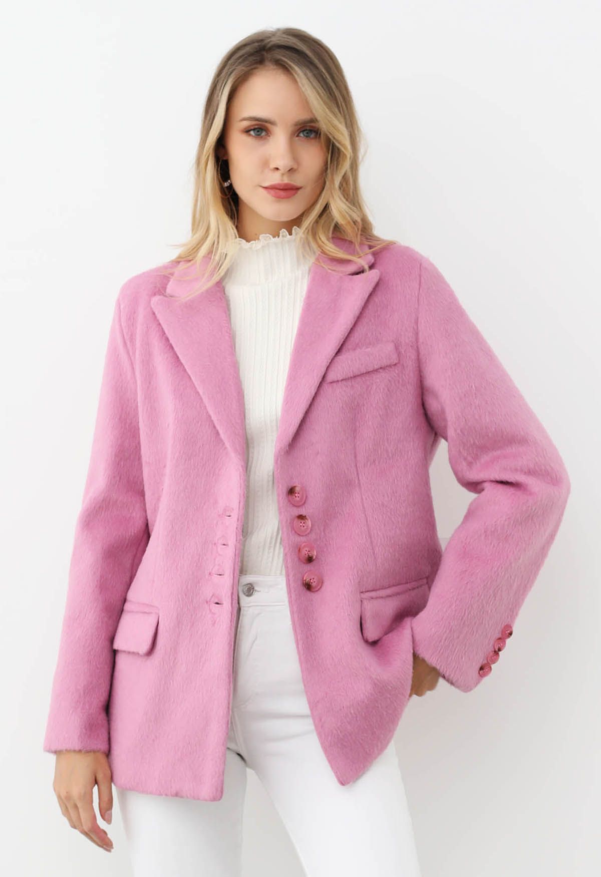 Manteau blazer boutonné en fausse fourrure à revers pointus en rose bonbon