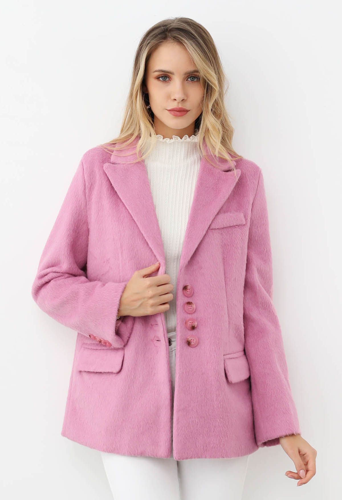 Manteau blazer boutonné en fausse fourrure à revers pointus en rose bonbon