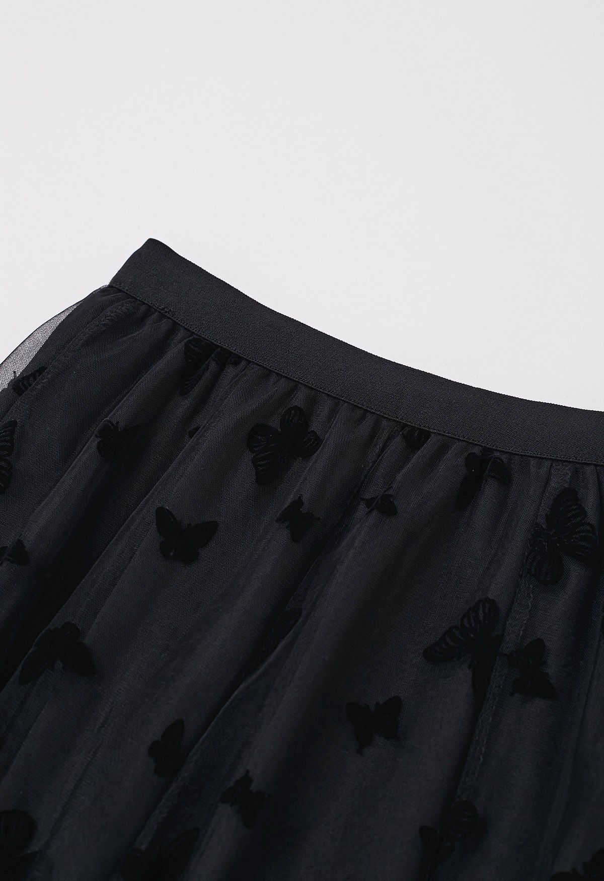 Jupe mi-longue en tulle à motif papillon valsé en noir