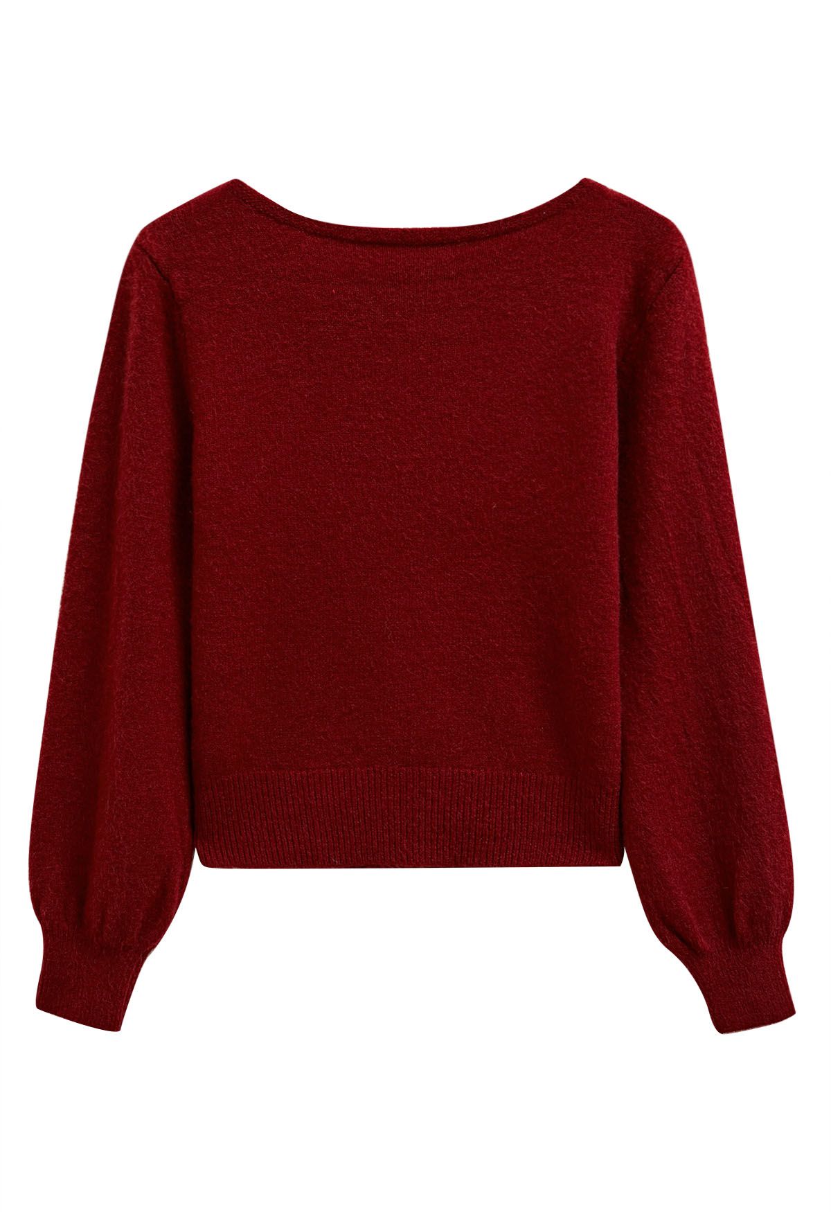 Pull en tricot à col bateau avec bordure en nœud papillon en rouge