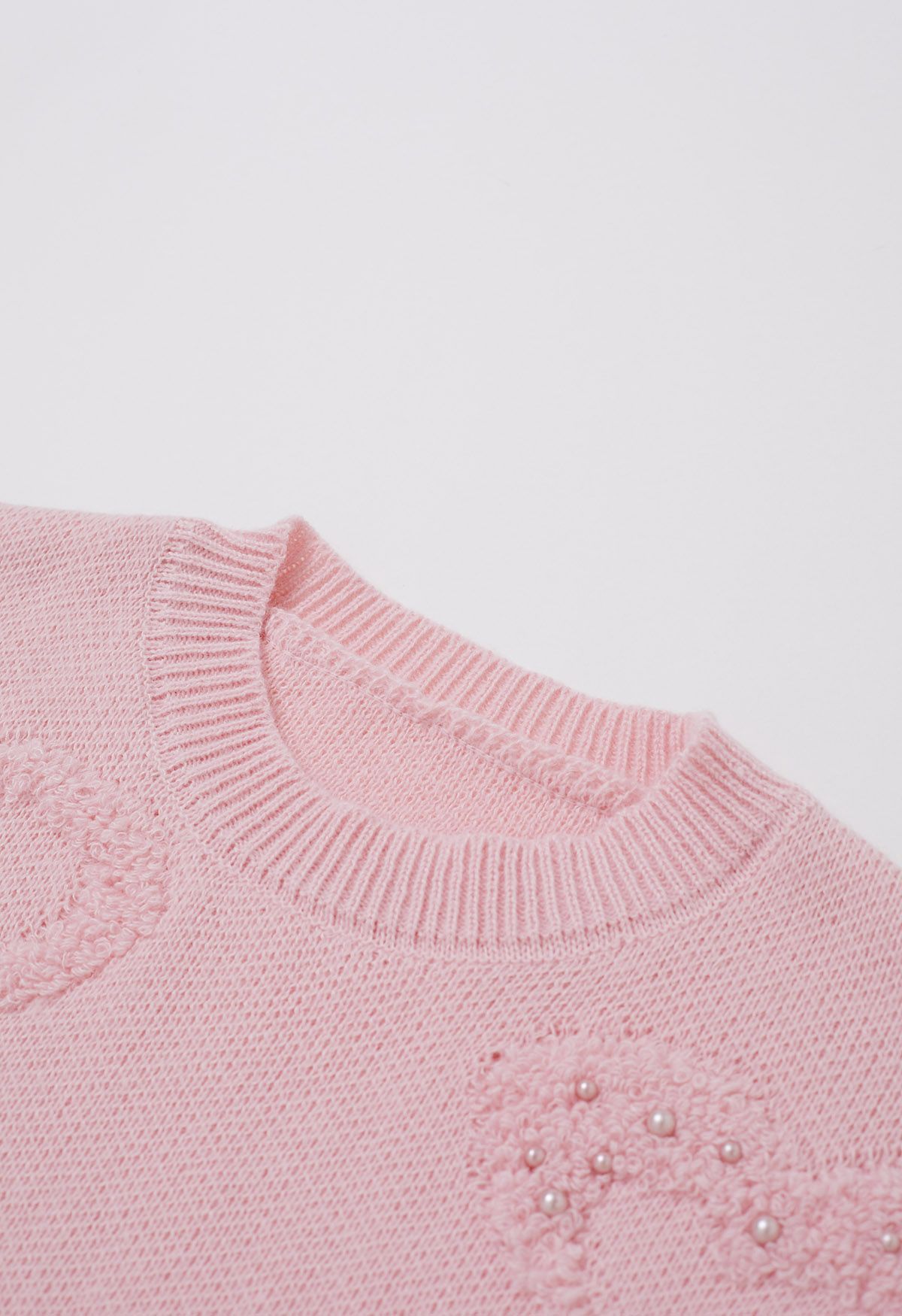 Pull oversize en maille jacquard avec bordure en perles et cœurs en rose