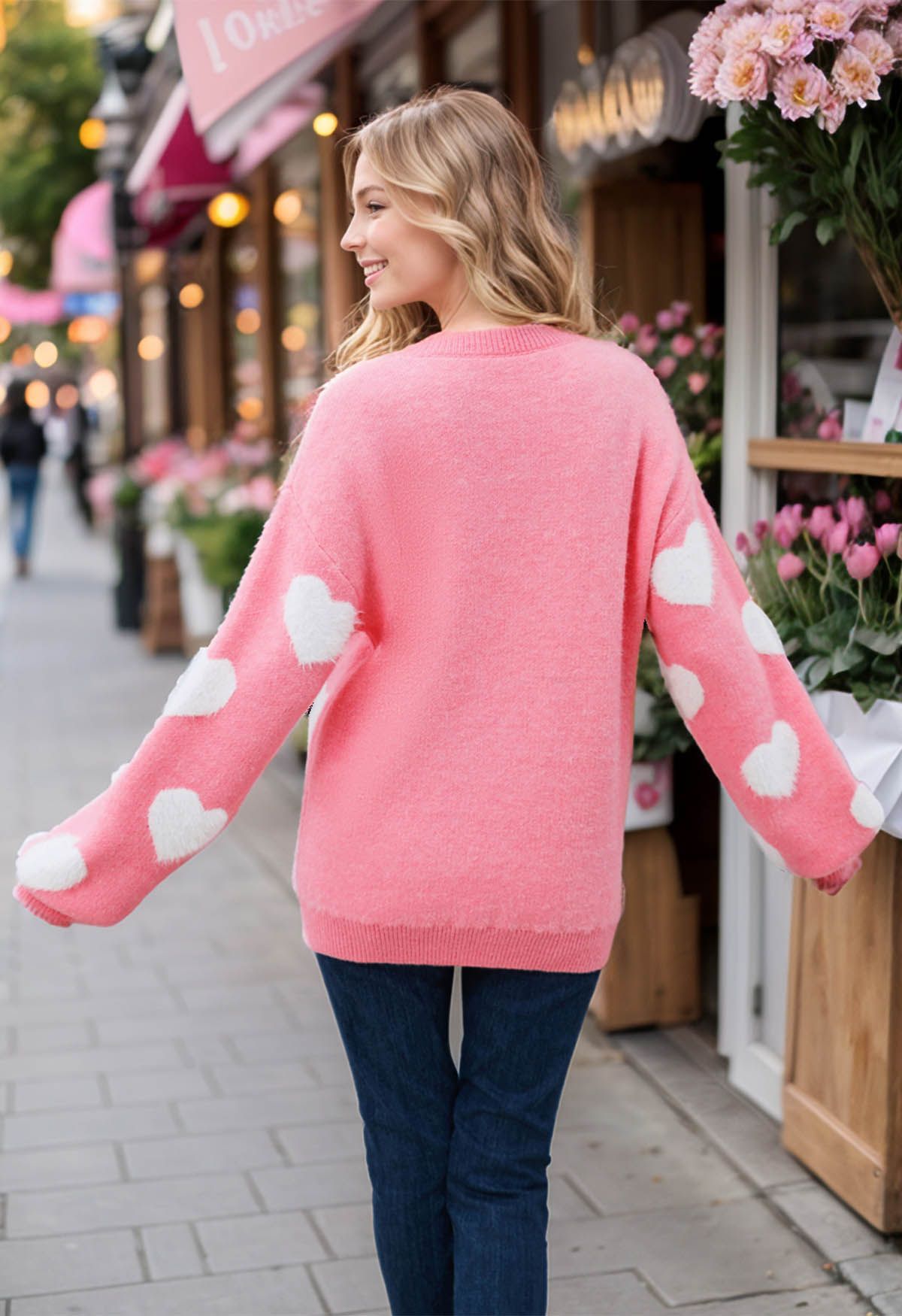 Pull ras du cou en tricot contrasté à motif cœur flou en rose bonbon