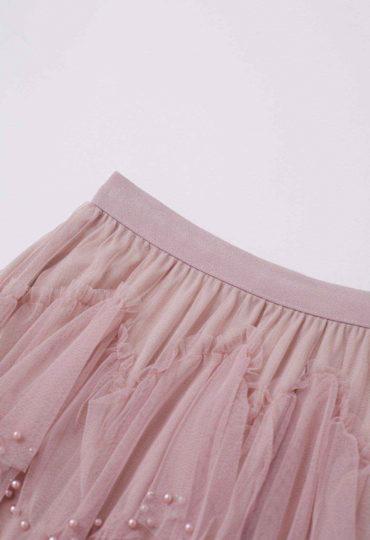 Jupe longue éthérée en tulle perlé à plusieurs niveaux en rose poudré