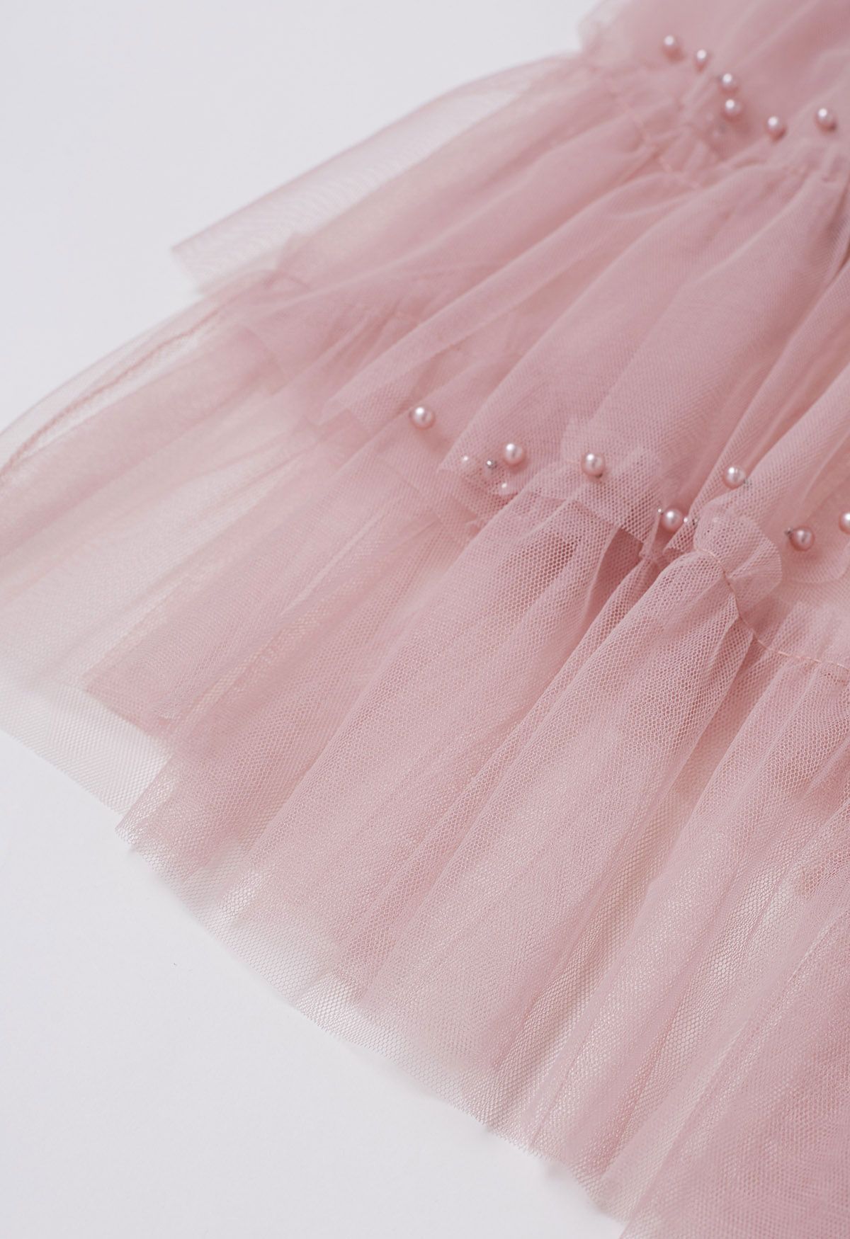 Jupe longue éthérée en tulle perlé à plusieurs niveaux en rose poudré