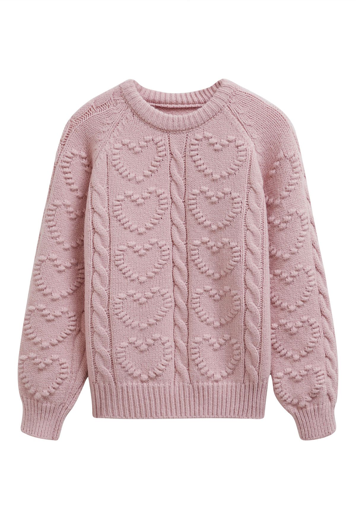 Pull en maille torsadée avec motif cœur en relief en rose clair