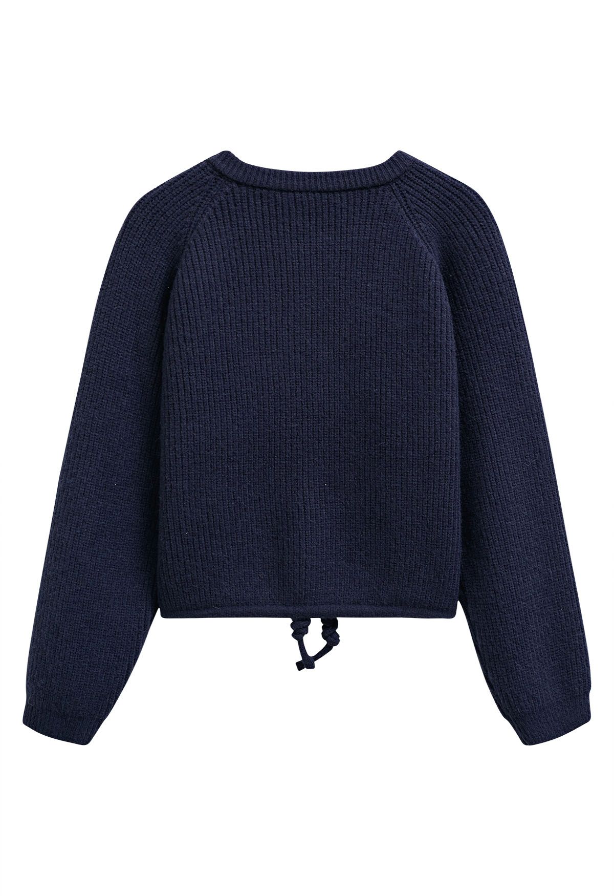 Cardigan en tricot côtelé avec cordon de serrage et fermeture éclair en bleu marine