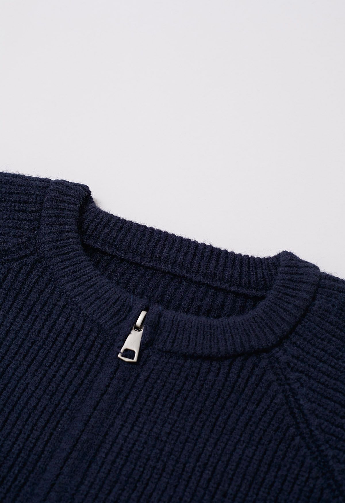 Cardigan en tricot côtelé avec cordon de serrage et fermeture éclair en bleu marine