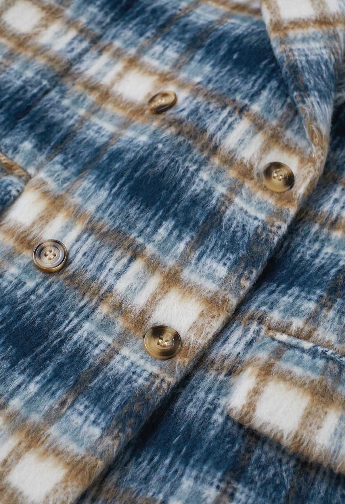 Manteau boutonné à carreaux et à revers pointus en indigo