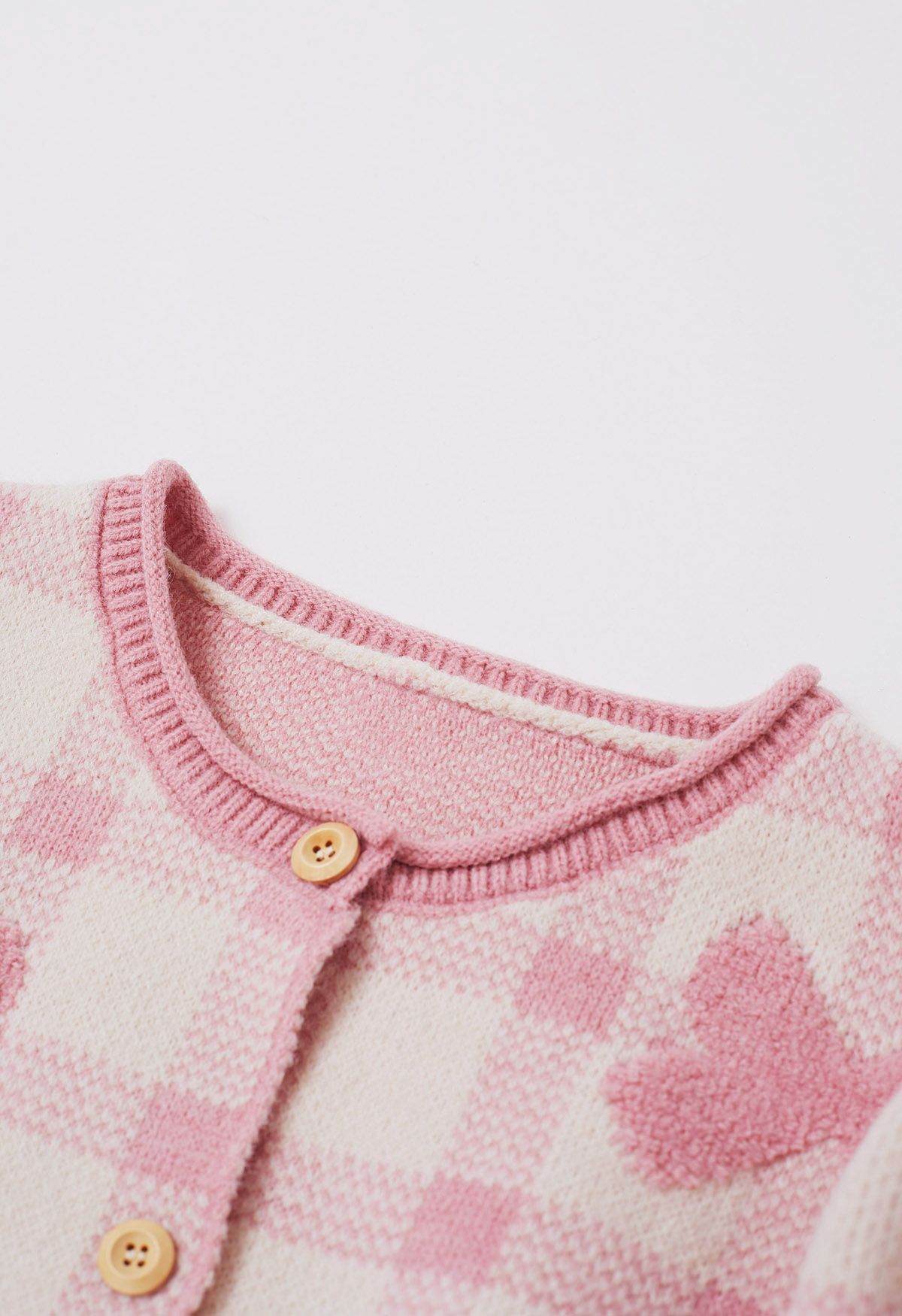 Cardigan boutonné en tricot à carreaux jacquard avec nœud papillon en rose