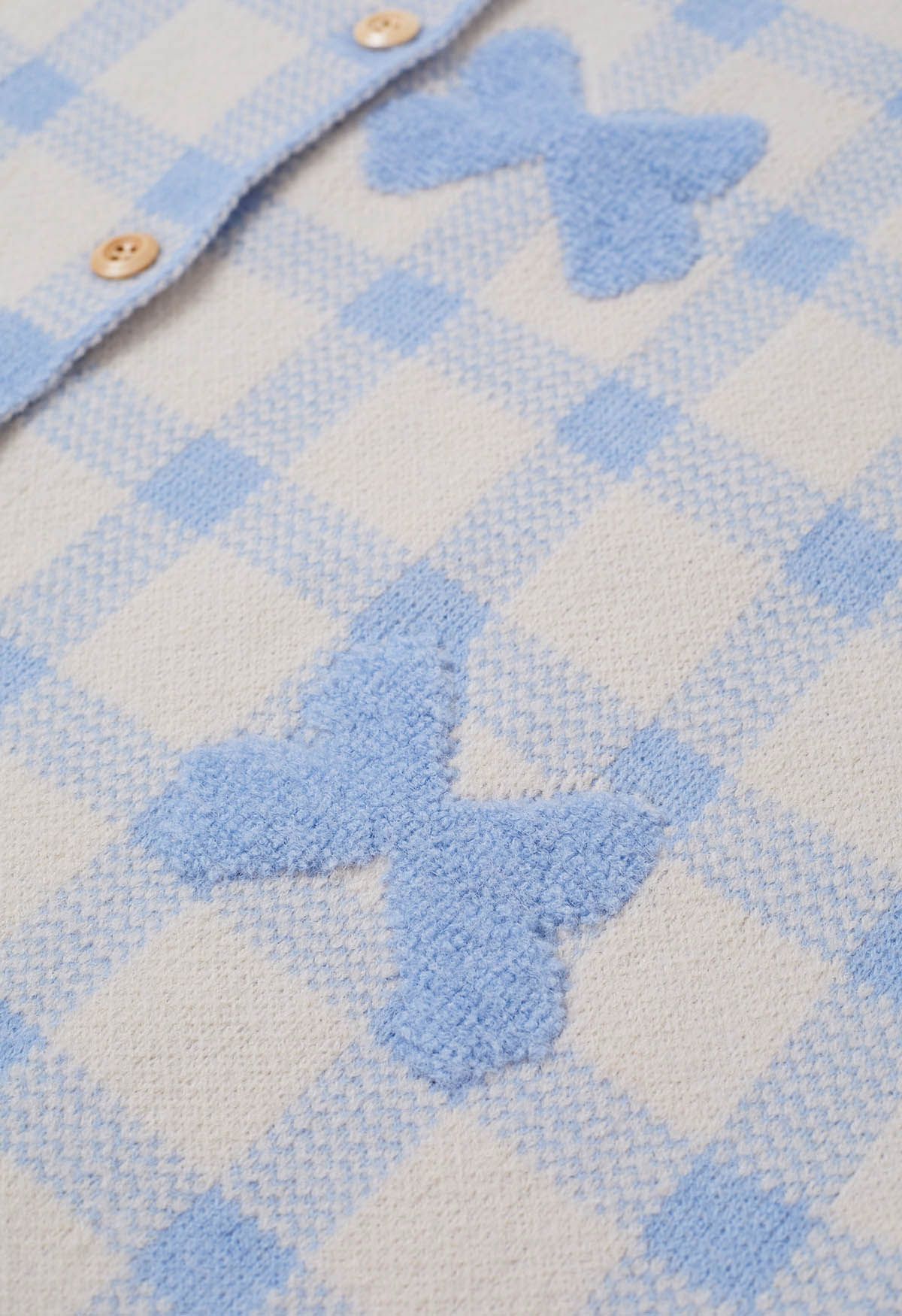 Cardigan boutonné en tricot à carreaux jacquard avec nœud papillon en bleu bébé