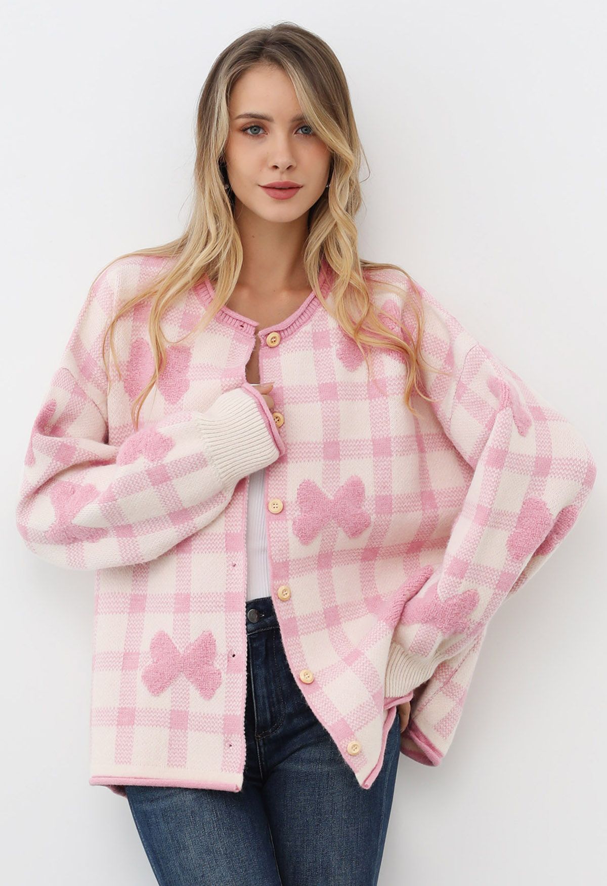 Cardigan boutonné en tricot à carreaux jacquard avec nœud papillon en rose