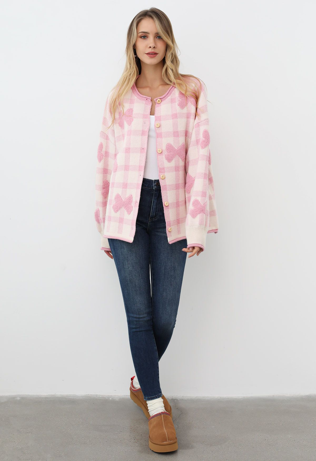 Cardigan boutonné en tricot à carreaux jacquard avec nœud papillon en rose