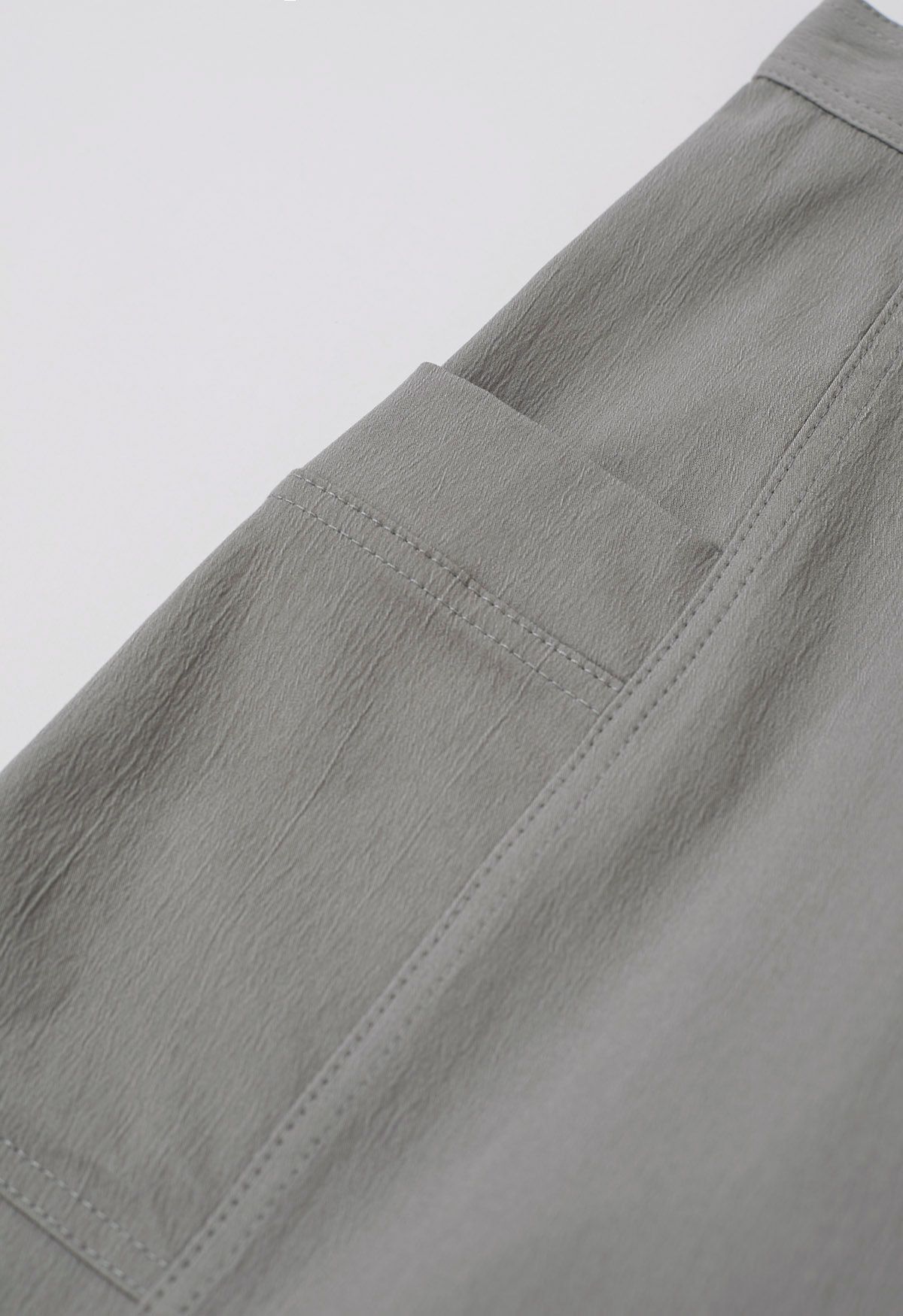 Pantalon large à poches latérales plaquées en gris