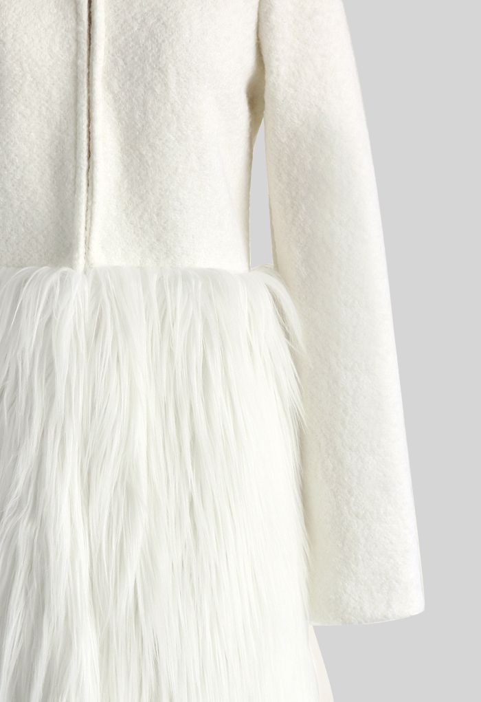 Manteau en fourrure blanc neige