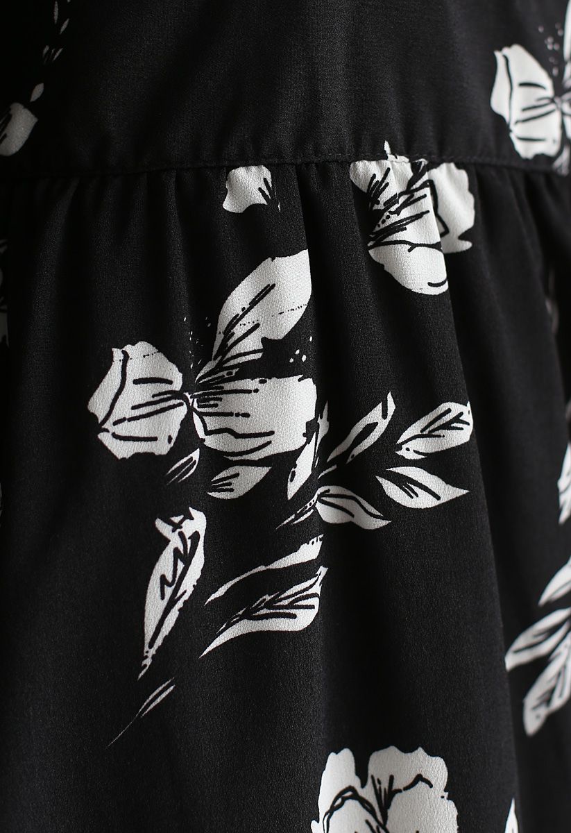 Robe fleurie cache-cœur illusion poétique en noir