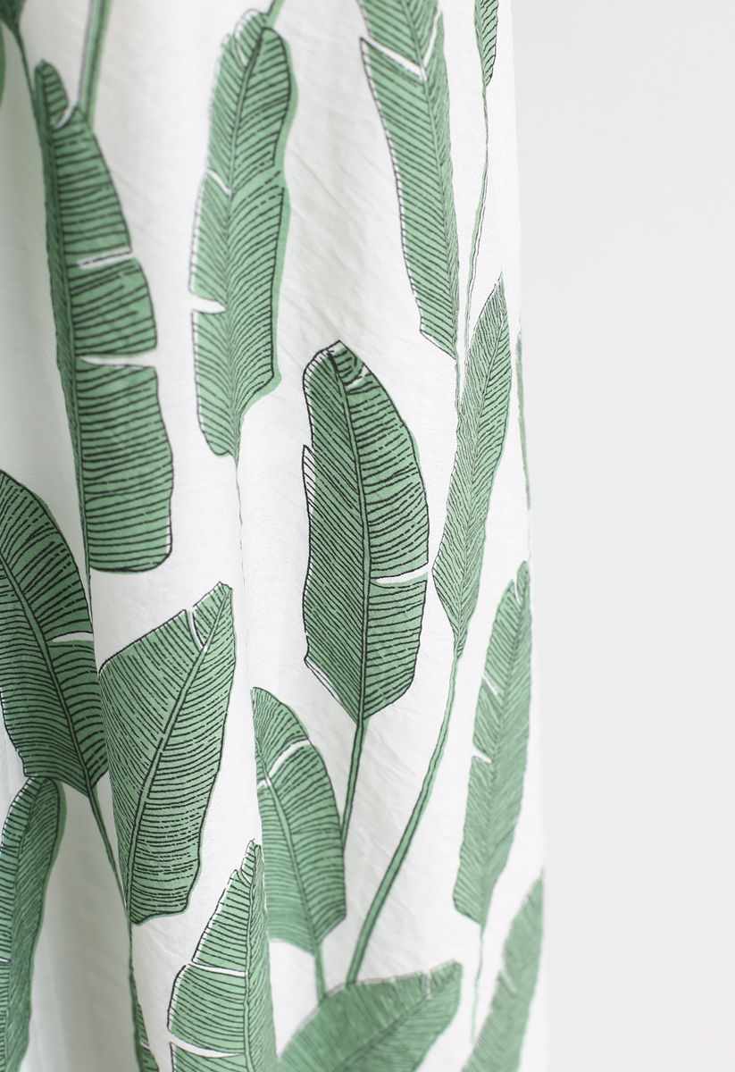 Robe longue à col licou et imprimé feuilles de palmier