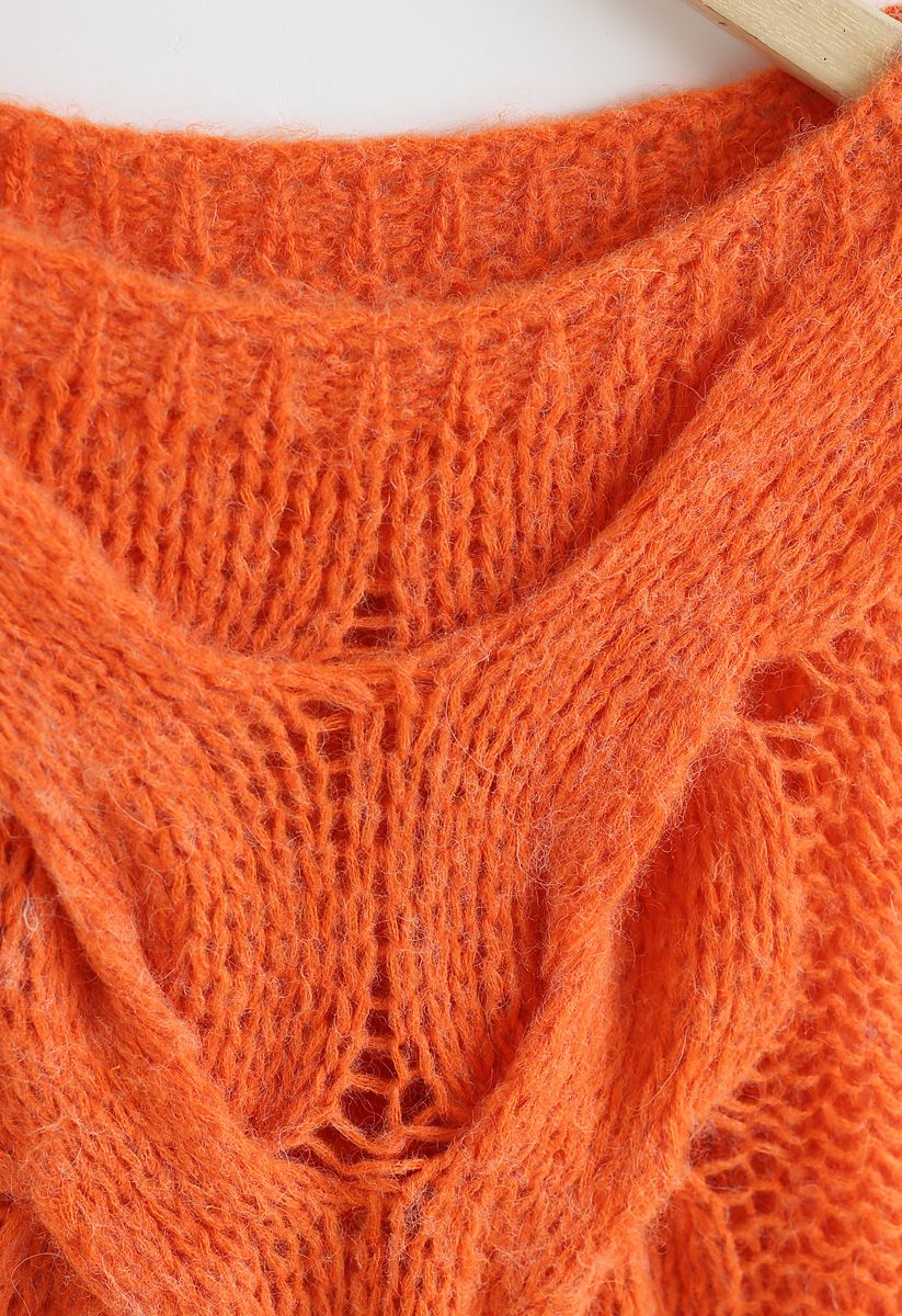 Pull manches bouffantes tricoté à la main en orange